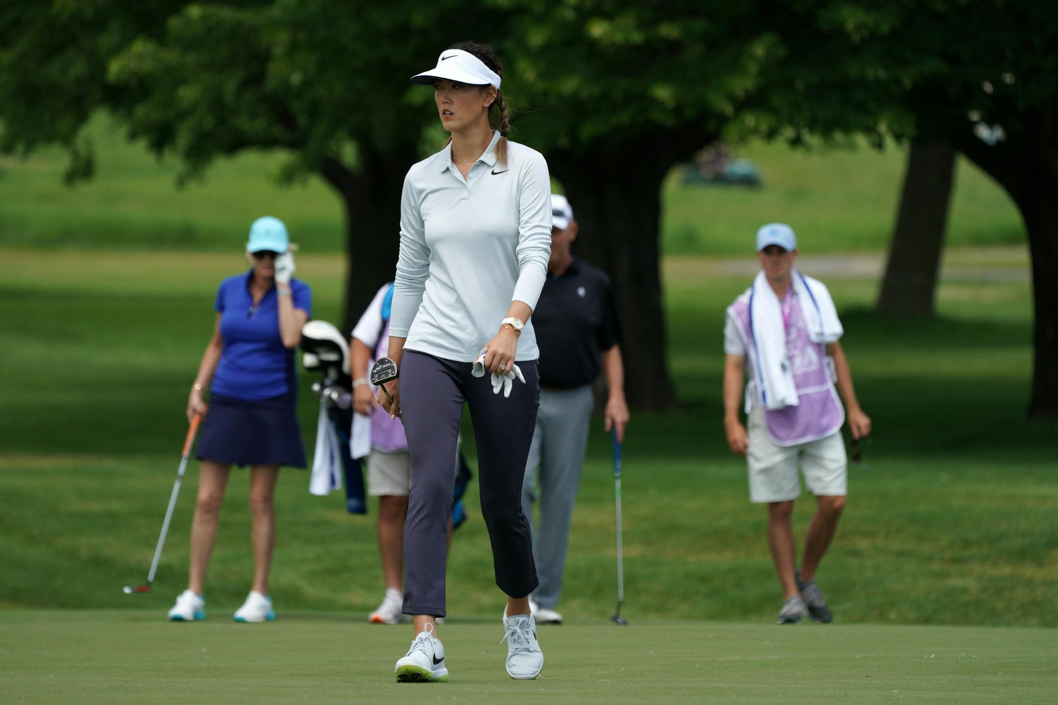 Michelle Wie lined up her shot on the 1st hole green Tuesday afternoon.