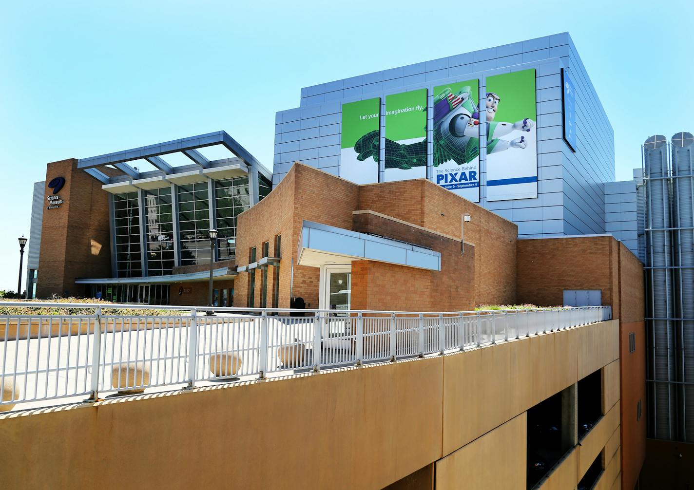 Giant panels of Buzz Lightyear from Toy Story fame announces the Science Behind Pixar exhibit that's opening Friday, June 9 at the Science Museum of Minnesota and seen Thursday, June 1, 2017, in St. Paul, MN.] DAVID JOLES • david.joles@startribune.com Science Behind Pixar exhibit that's opening at the Science Museum of Minnesota ORG XMIT: MIN1706011514341786