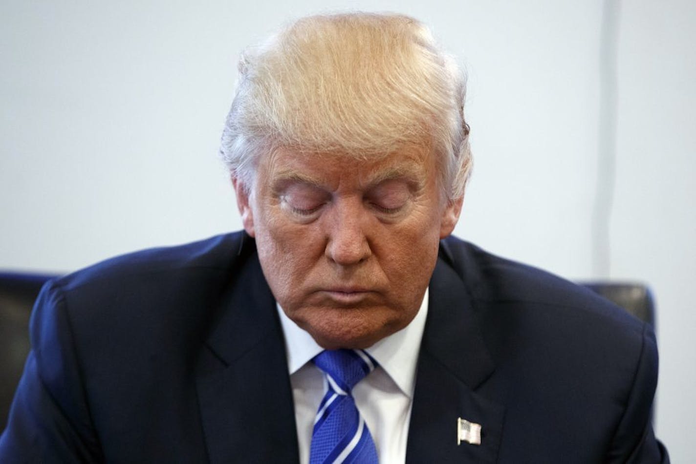 Republican presidential candidate Donald Trump paused during a meeting with members of the National Border Patrol Council at Trump Tower, Friday, Oct. 7, 2016, in New York.