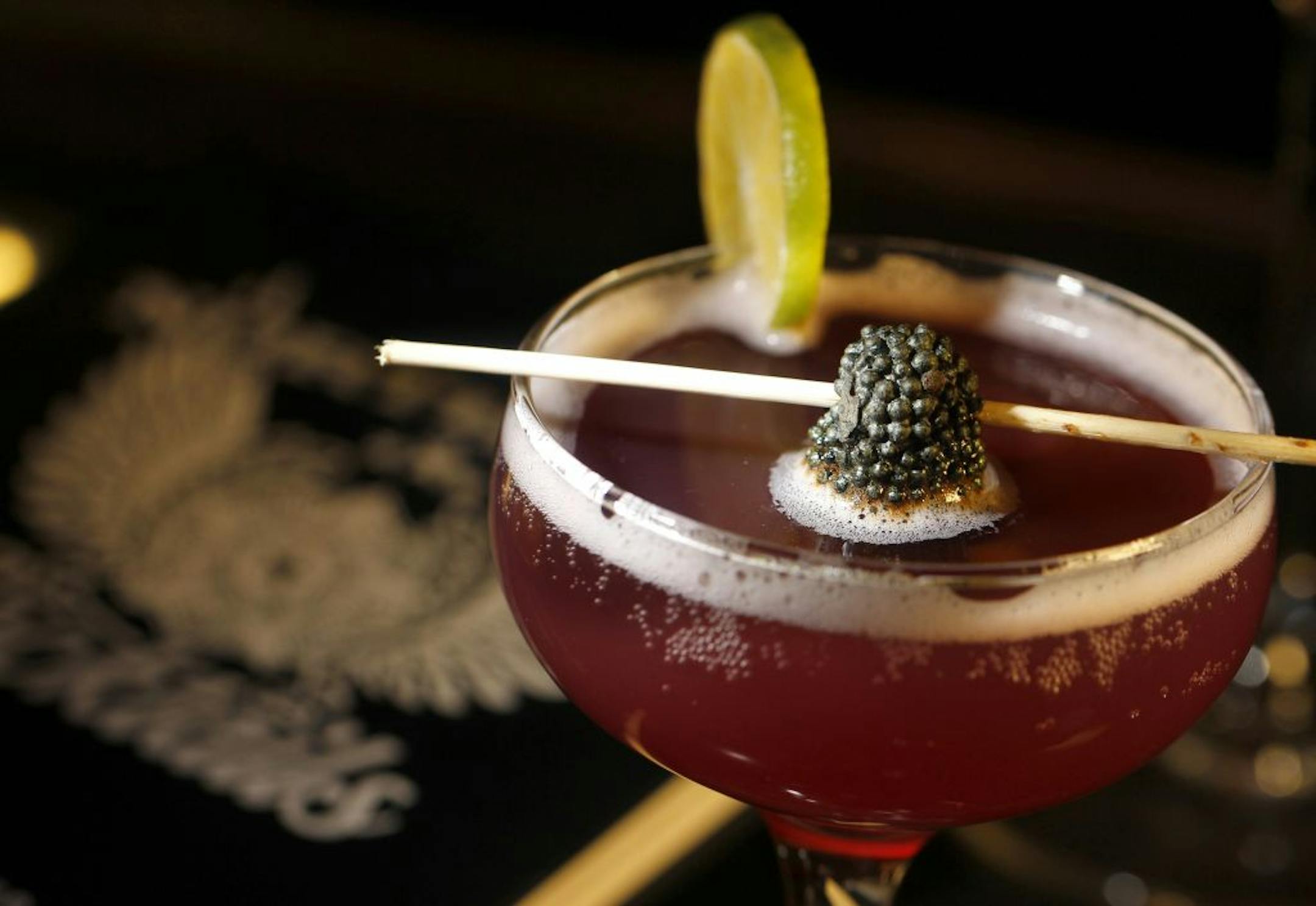 One of the bar scene's top mixologists, Johnny Michaels, has published a book of cocktails. Johnny with some of his cocktails at La Belle Vie, Minneapolis MN.[ TOM WALLACE � twallace@startribune.com _ Assignment _#20020400A October 31, 2011 _ SLUG: drink1106_ EXTRA INFORMATION: Name CQ by writer.