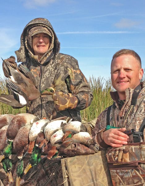 The late Don Soderlund, left, who lived on Pelican Lake near Albertville, Minn., hunted ducks in South Dakota in 2013 with his son, Don Soderlund III.