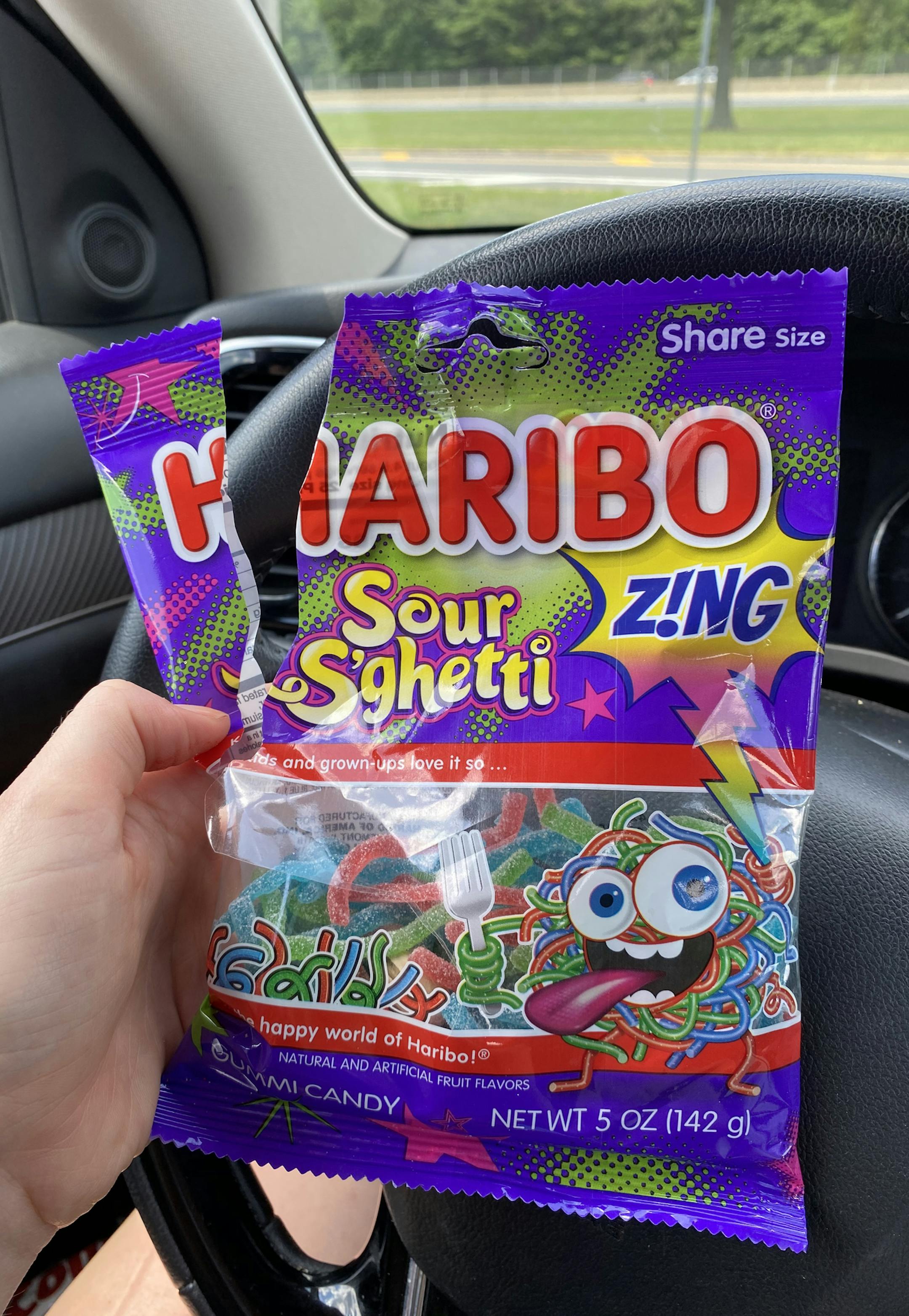 Natalie B. Compton holds Haribo Sour S'ghetti candy for a road trip in Pleasantville, New York, July 11, 2020. MUST CREDIT: Washington Post photo by Natalie B. Compton