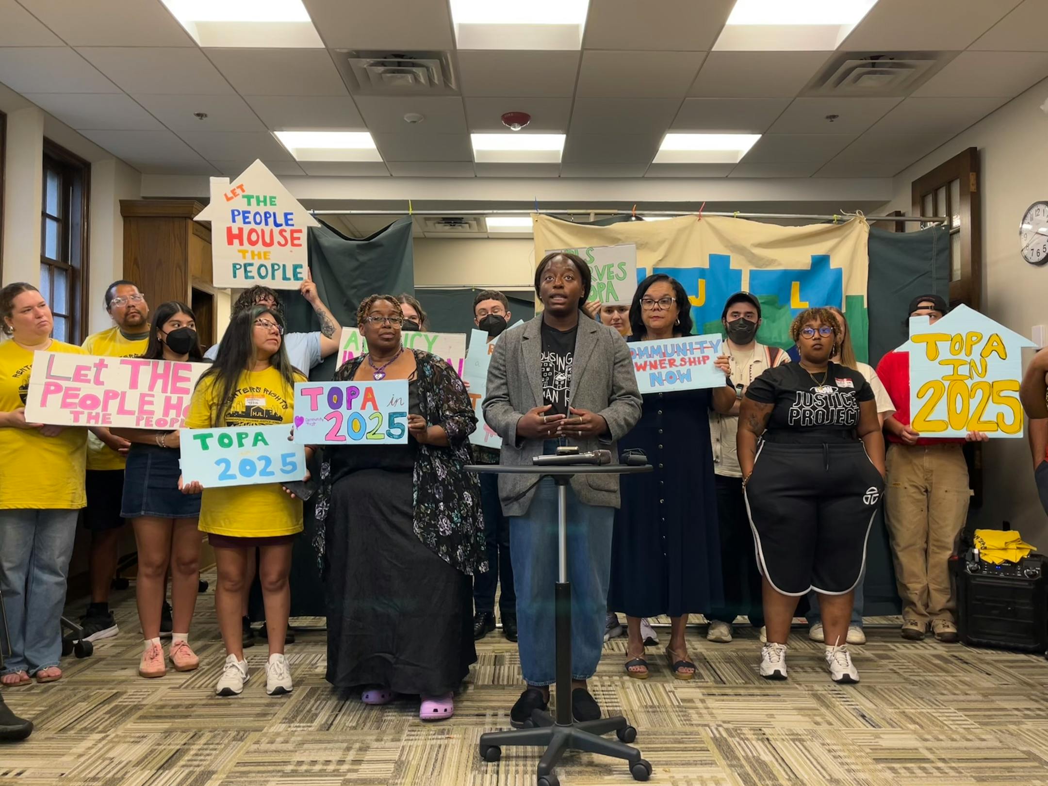 Temi Ogunrinde, equity and engagement director of nonprofit Housing In Action, stood in front of many proponents of the Tenant Opportunity to Purchase Act and voiced her support on Oct. 5, 2025.
