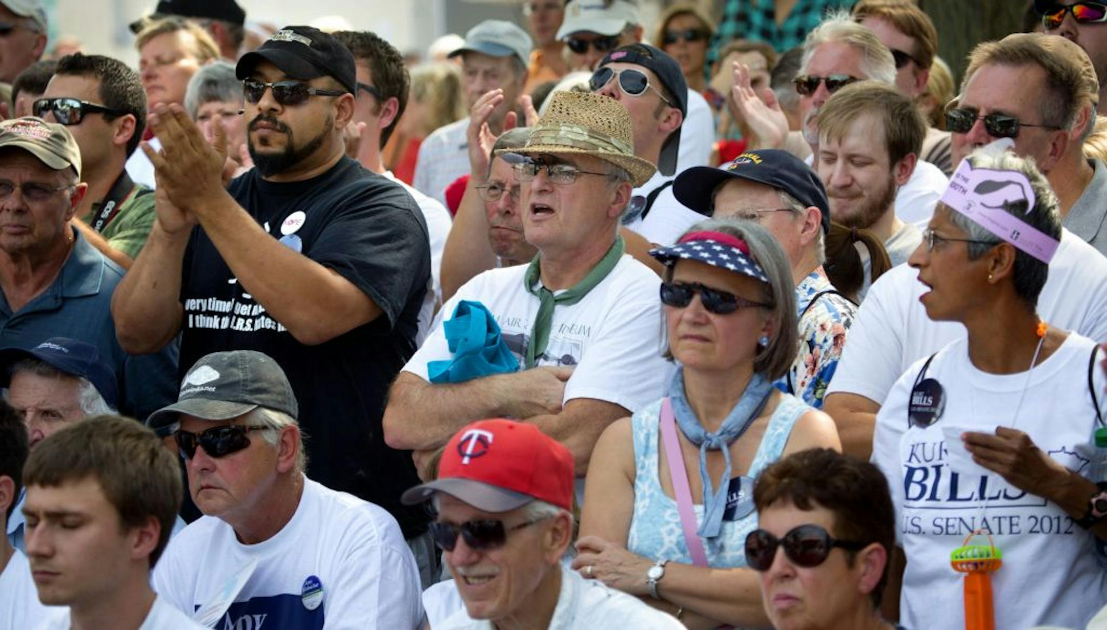 The boisterous crowd got involved with both candidates. Bills supporters cheered when Klobuchar asked if they would "go for a plan … that eliminates" the U.S. Energy and Education departments.