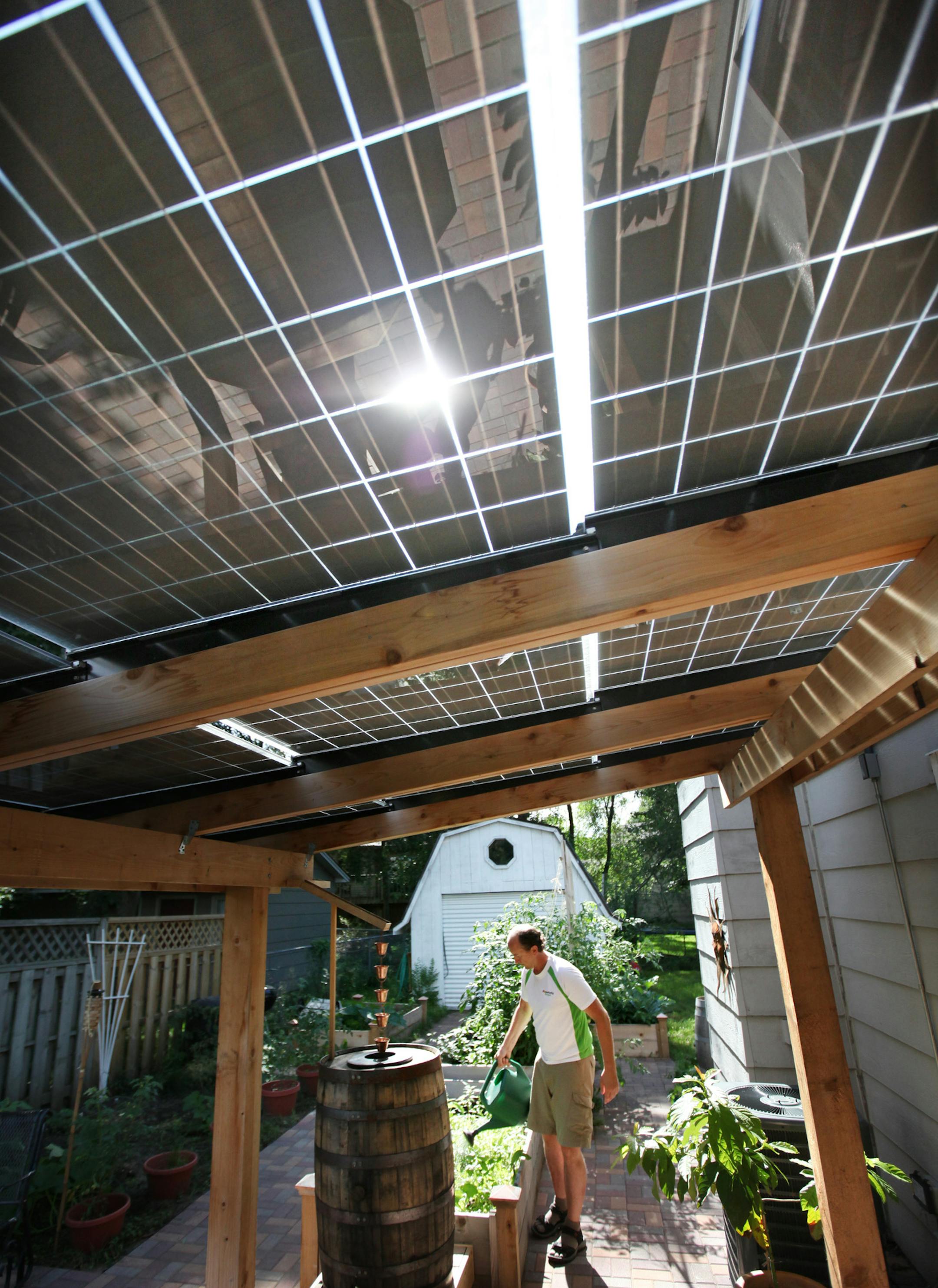 Daniel Williams, owner of Powerfully Green, has installed solar panels on a home office in Champlin.