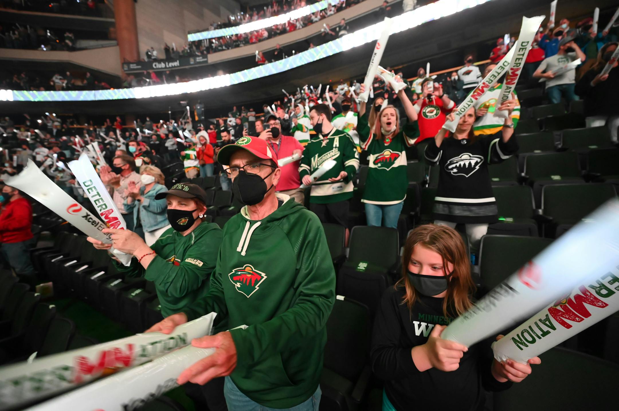 Sharon Hurley, Dave Linn and Olivia Linn 9 cheer at game 3 between the Minnesota Wild and the Vegas Golden Knights.