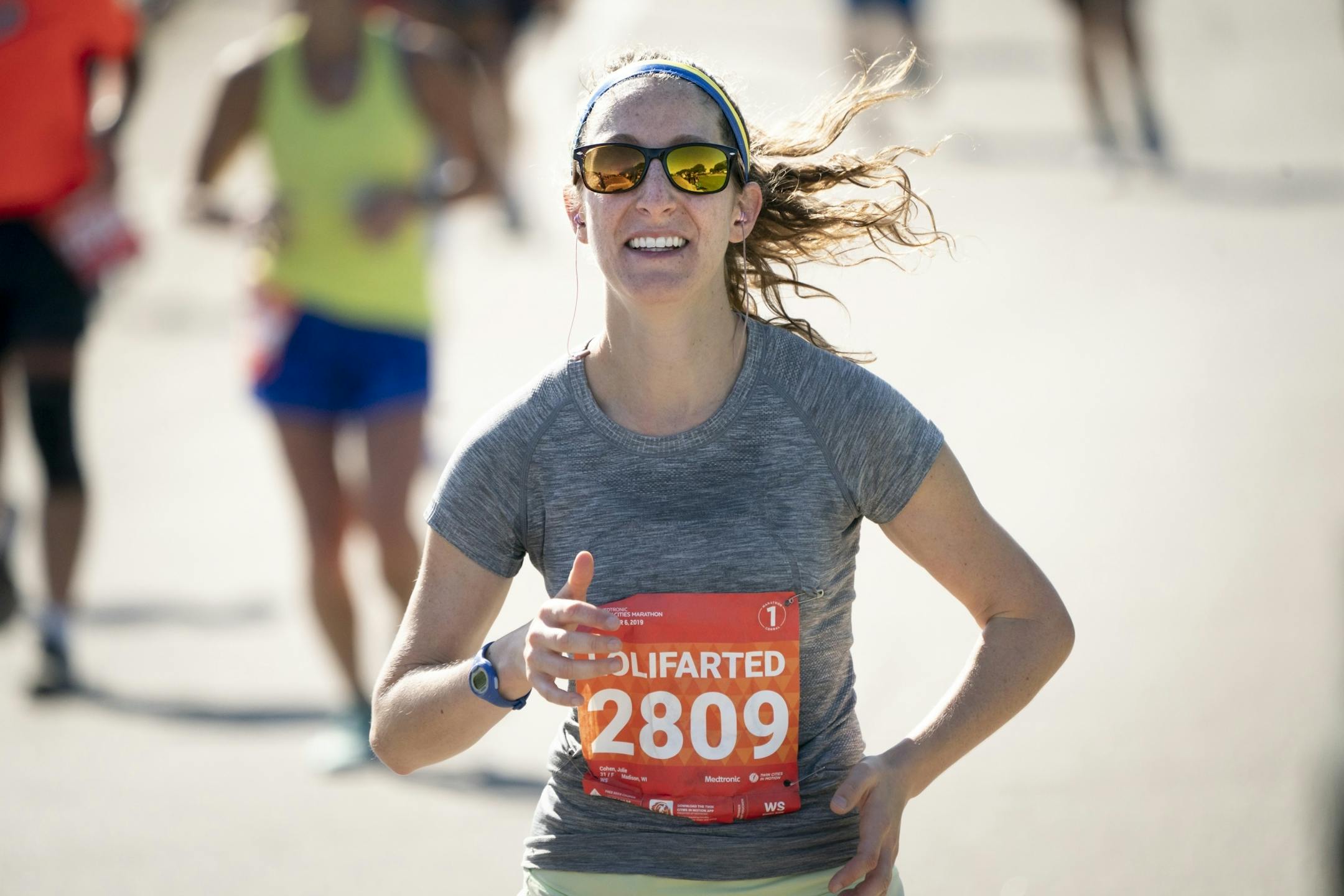 Julie Cohen smiled as the State Capitol came into view in the final mile.