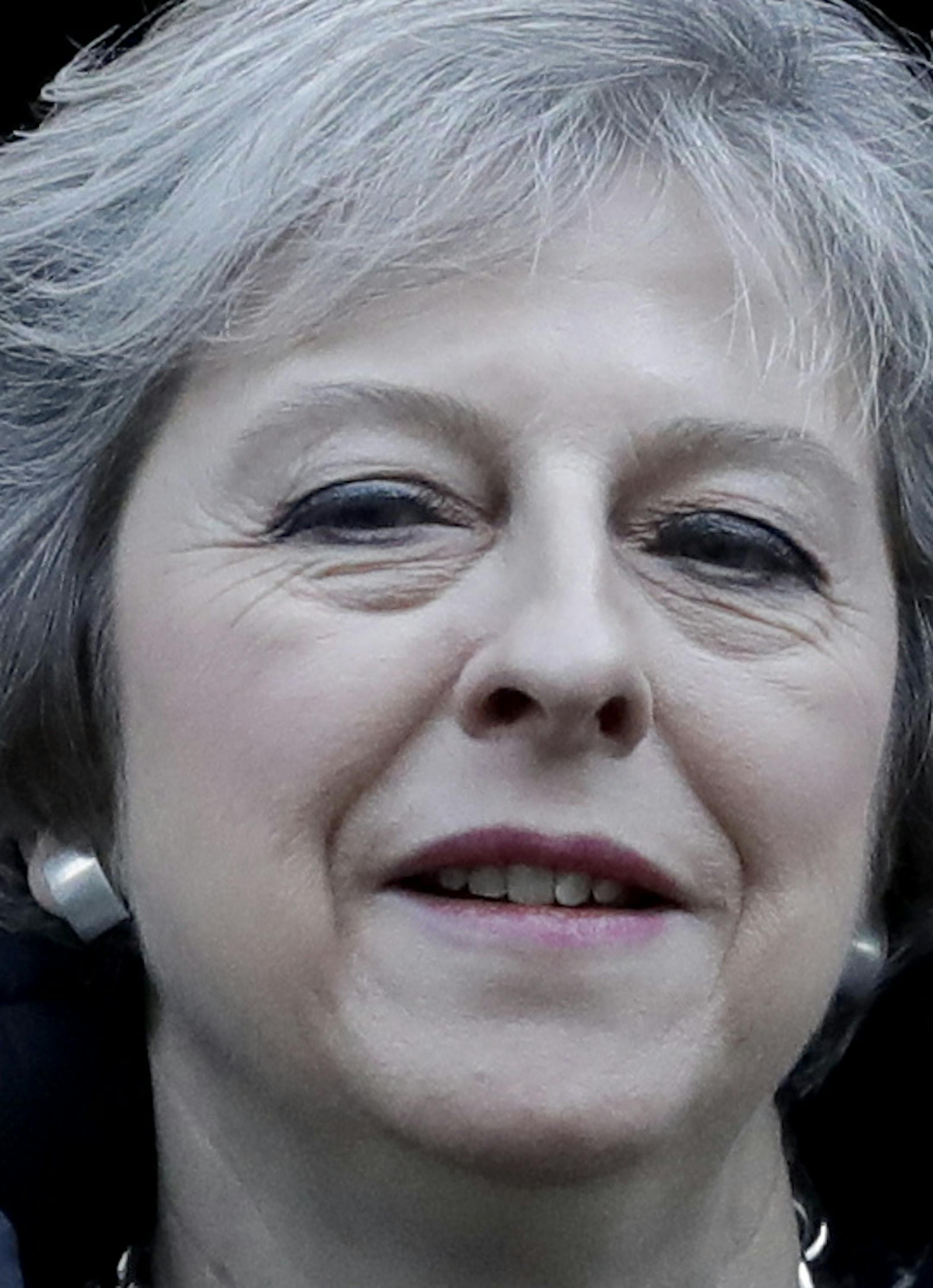 British Prime Minister Theresa May leaves 10 Downing Street in London, to attend Prime Minister's Questions at the Houses of Parliament, Wednesday, Jan. 18, 2017. (AP Photo/Matt Dunham) ORG XMIT: LMD108