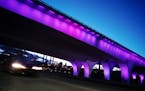 The 35W Bridge was lit purple to mark the one-year anniversary of Prince's passing on April 20, 2017 in Minneapolis, Minn. (RIchard Tsong-Taatarii/Min