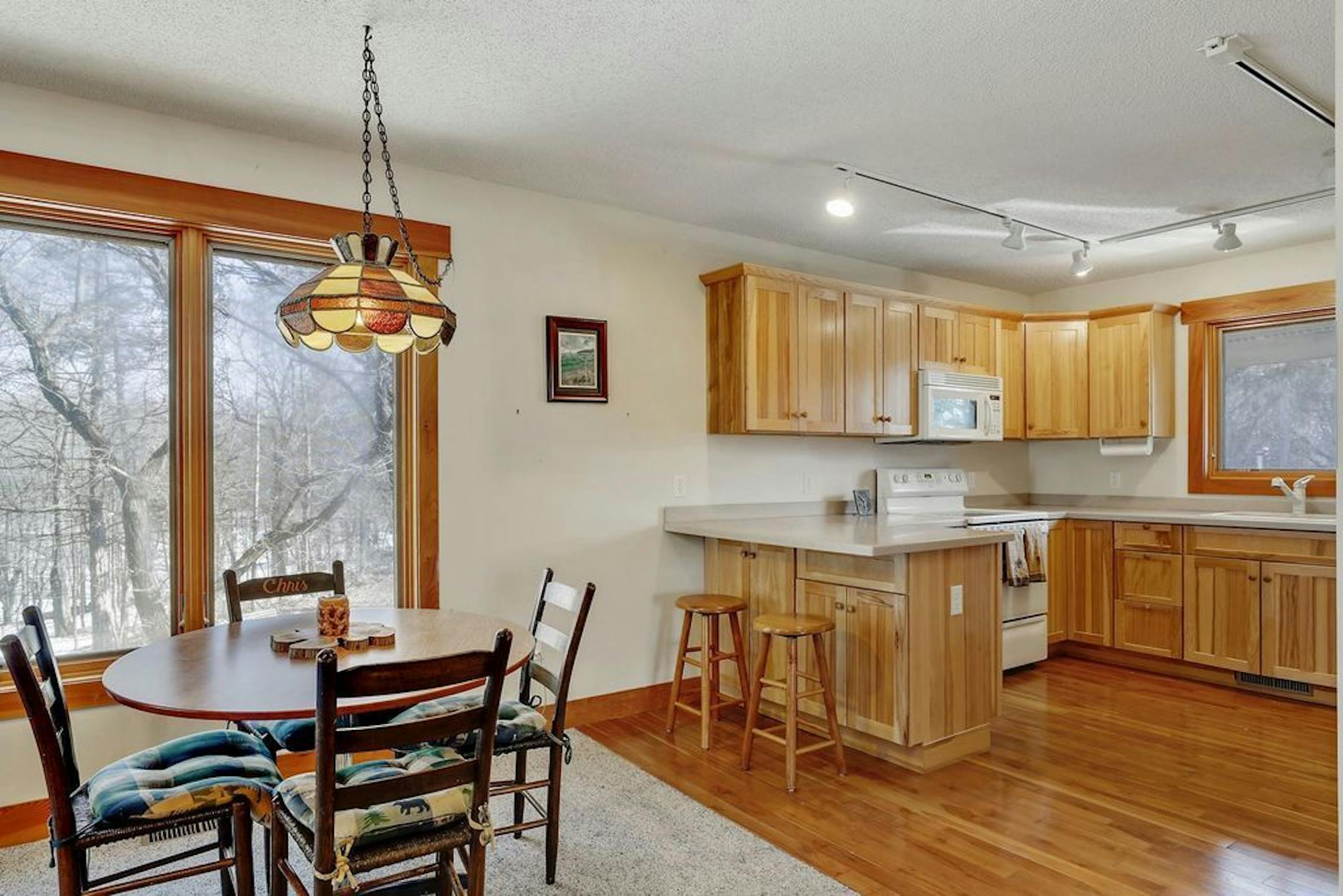 Dining area and kitchen in the apartment above the garage.