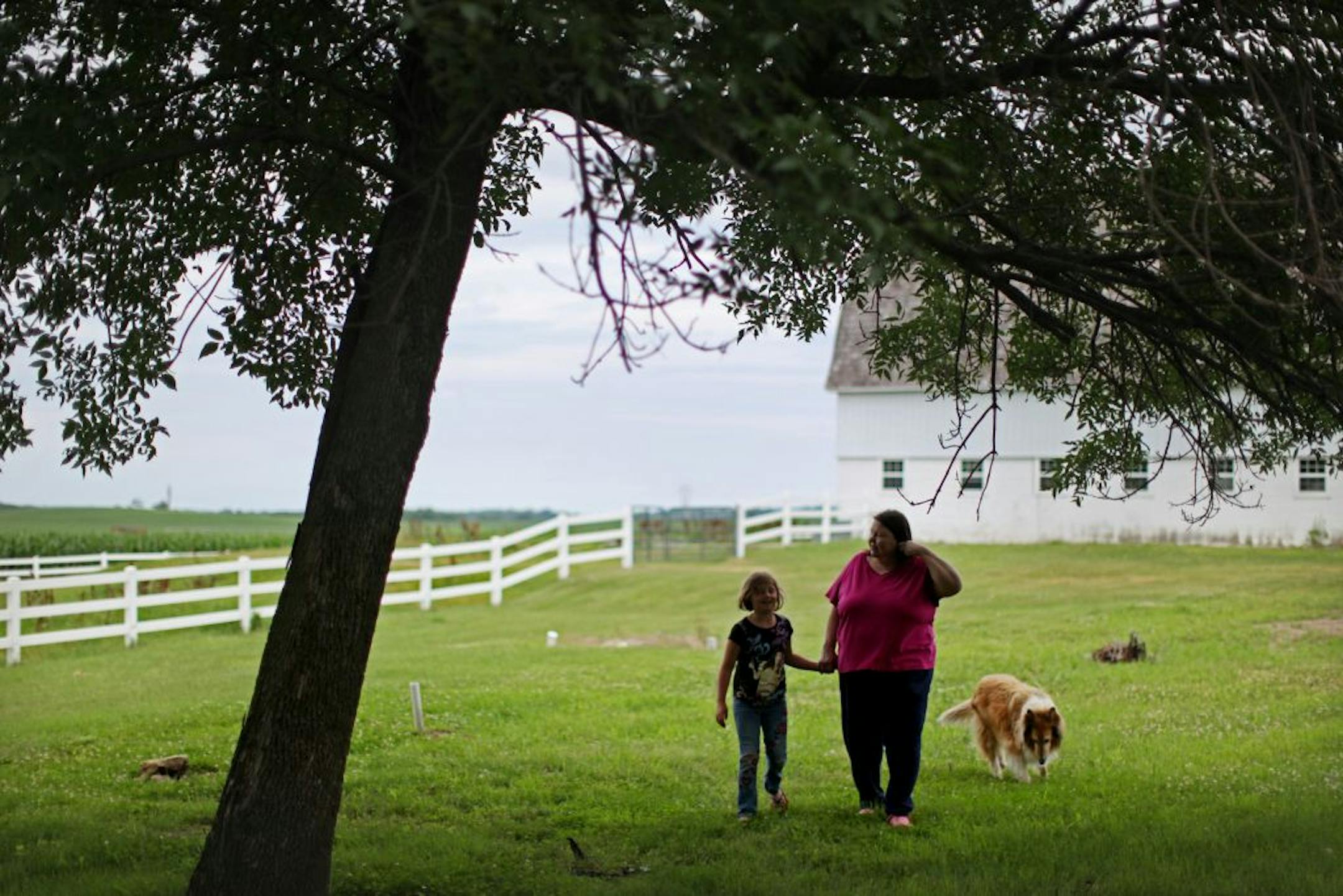 Cindy Hood took a stroll on her property in rural Hastings with her granddaughter Emma. She can now walk wherever she'd like after surgery at Mayo Clinic that corrected a rare eye condition called aniridia, the congenital absence of the iris.