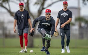 Minnesota Twins Byron Buxton (25) worked on drills in the outfield Monday. The full team has reported to the 2024 Minnesota Twins, spring baseball