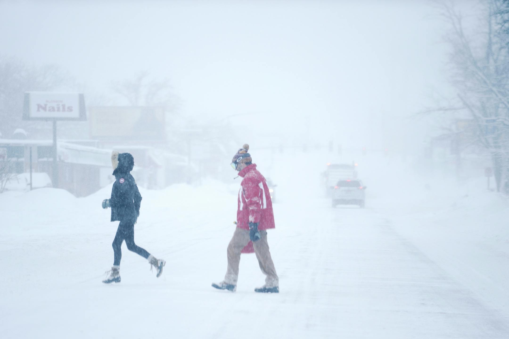 It might have been easier to walk Wednesday morning, like this couple crossing Lyndale Avenue S. in Minneapolis.