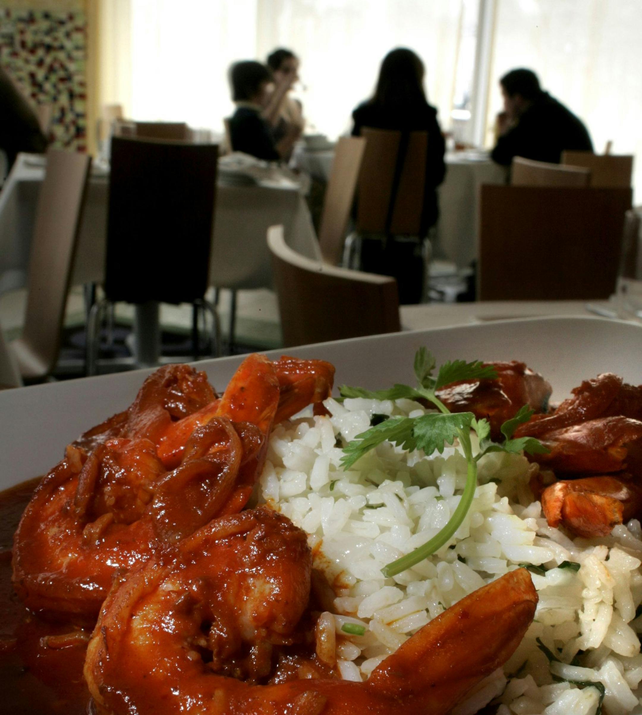 STEVE RICE \u2022 srice@startribune.com Masa, a new Minneapolis restaurant, offers Camarones en Salsa Guajillo with sauteed shrimp with guajillo sauce and cilantro rice for $18.75. ORG XMIT: MIN2013062614545711