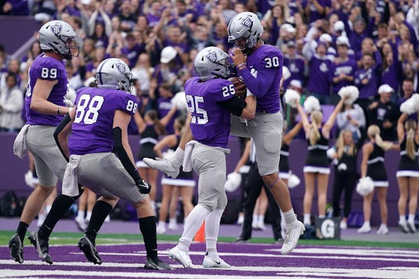St. Thomas punter Kolby Gartner (30) celebrated getting the two point conversion in the scond quarter. ] ANTHONY SOUFFLE • anthony.souffle@startribu