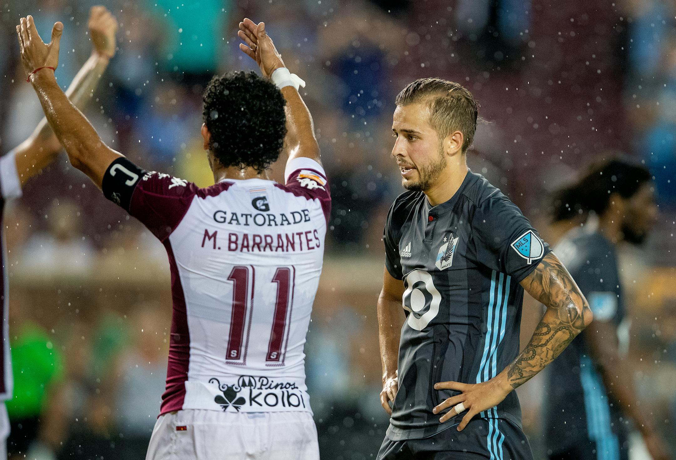 Michael Barrantes celebrated in front of Harrison Heath at the end of the game.