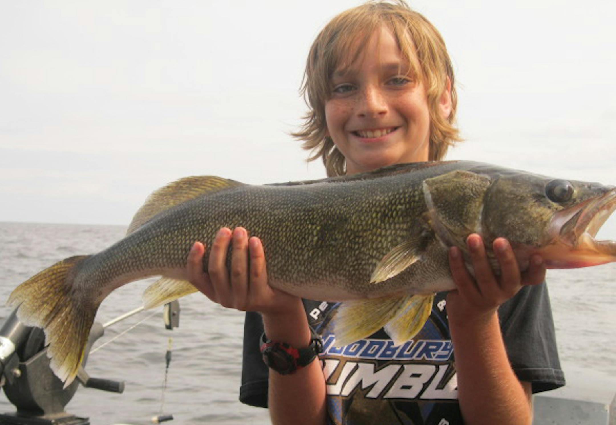 WHAT A WALLEYE Michael Dean-Hendricks, 12, of Woodbury caught this 27.5-inch walleye on his first trip to Lake of the Woods with his dad and his uncle John. They were down-rigging for walleyes in 34-feet of water using various crank baits.