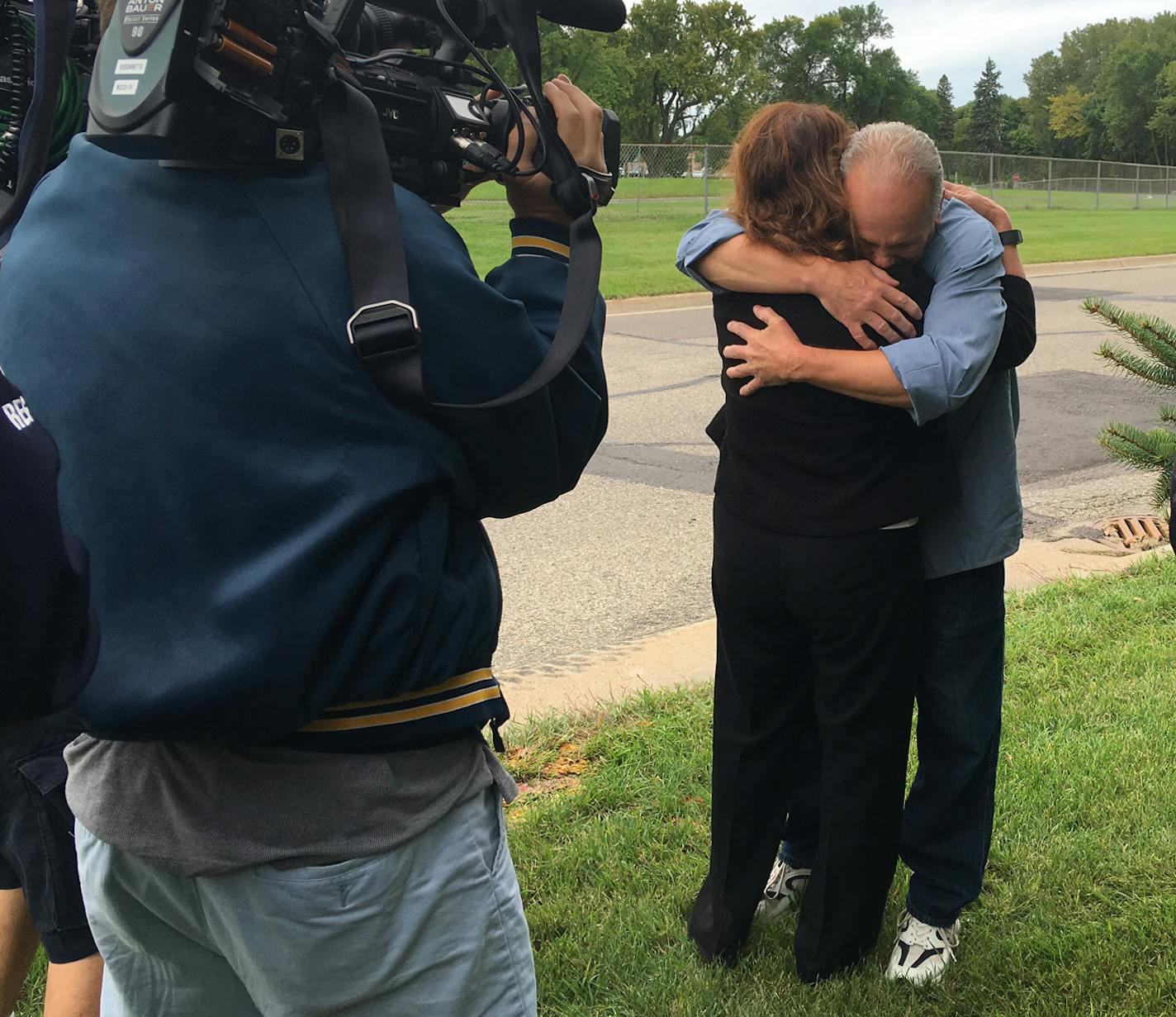 Terry Lynn Olson received a hug from Julie Jonas, Legal Director of IPMN after he was released prison.