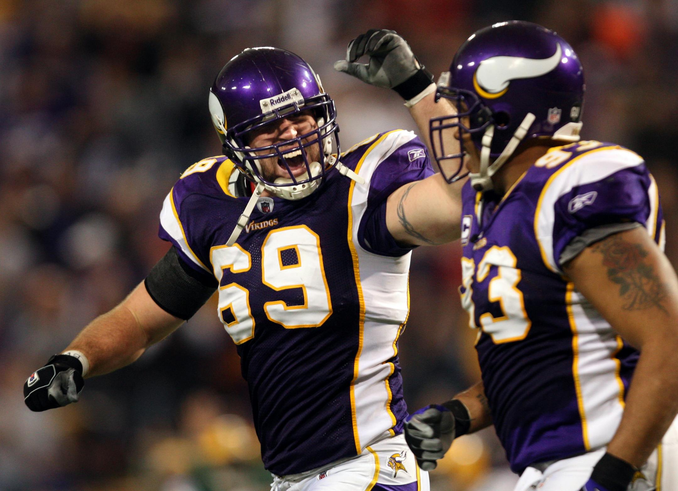 Jared Allen (69) with Kevin Williams (93) celebrated after a safety in the second quarter.