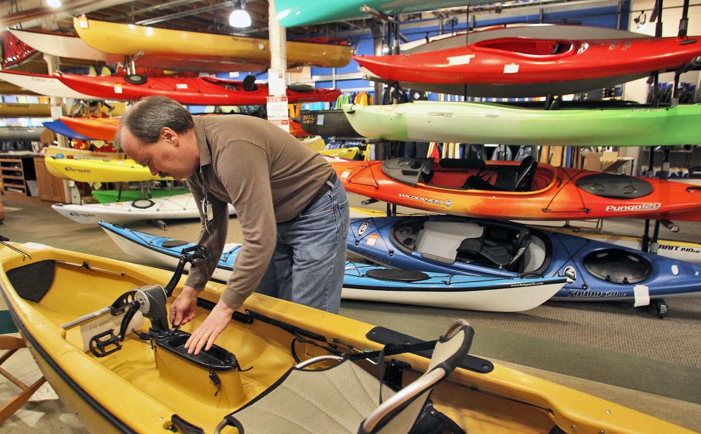 Hoigaard's, the St. Louis Park based sporting goods store, is being sold to Vail Resorts. Hoigaard's sales person worked with a propeller system in the store's kayak department. (MARLIN LEVISON/STARTRIBUNE(mlevison@startribune.com (cq )