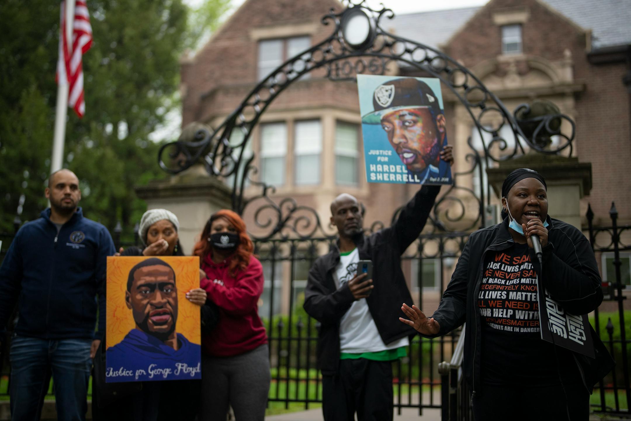 Krisha Lewis addressed the small group that swelled to about 60 people, gathered on the sidewalk in front of the Governor's Residence to honor the memory of George Floyd.