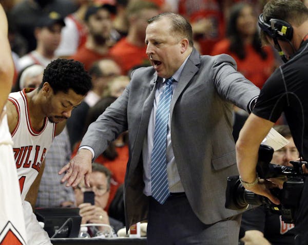 Wolves coach Tom Thibodeau, right, arrived back at United Center to coach against his former Bulls team for the first time Tuesday night since he was 