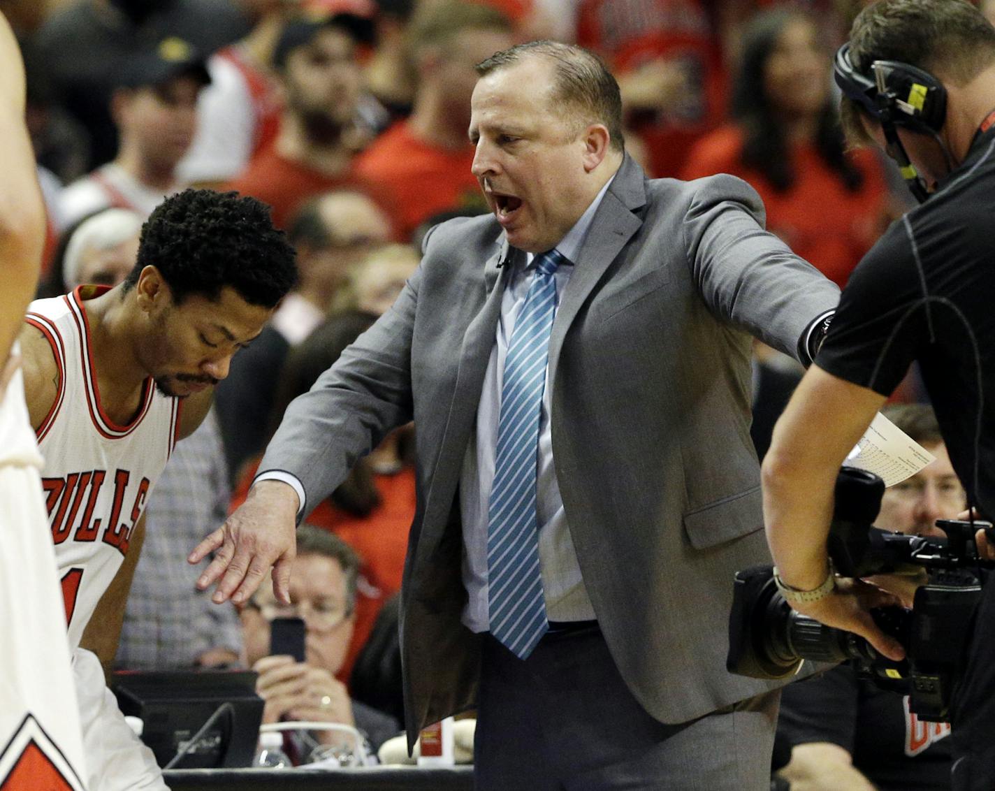 Wolves coach Tom Thibodeau, right, arrived back at United Center to coach against his former Bulls team for the first time Tuesday night since he was fired in May 2015.