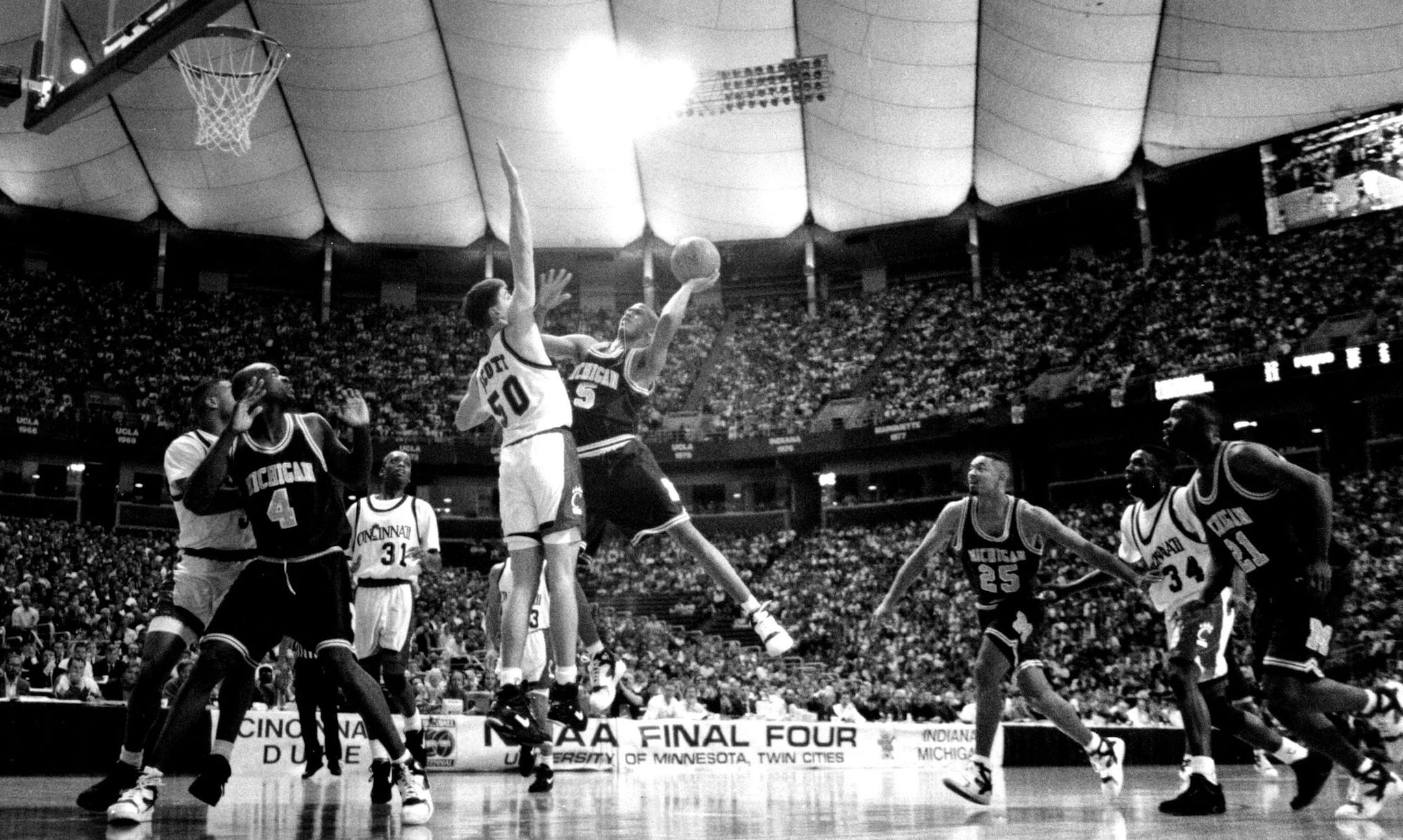 Jalen Rose and Michigan's Fab Five stormed into the title game in their freshman year, beating a talented Cincinnati team coached by Bob Huggins in the semis.