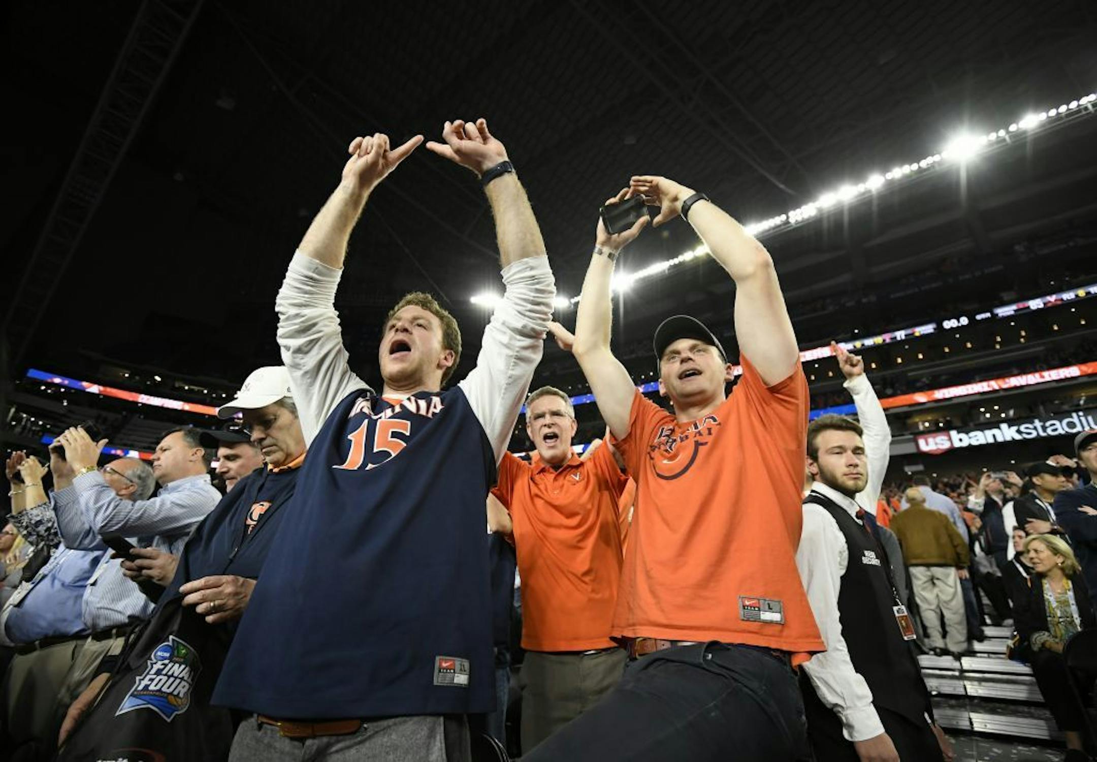 Virginia fans cheered after their win against Texas Tech 85-87 in overtime.