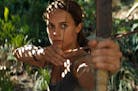 Photo Credit: Ilze Kitshoff ALICIA VIKANDER as Lara Croft in Warner Bros. Pictures' and Metro-Goldwyn-Mayer Pictures' action adventure "TOMB RAIDER," 