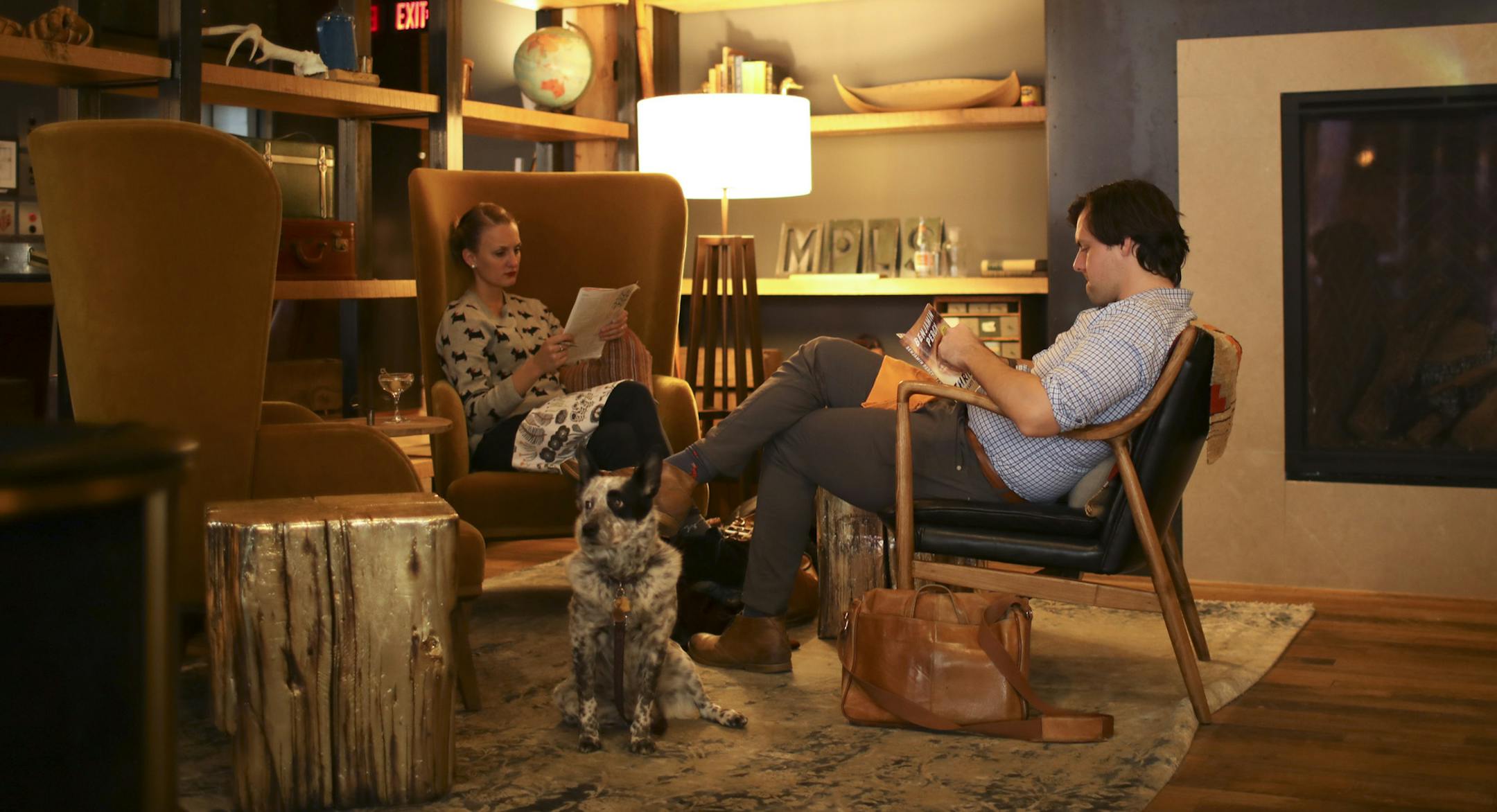 The lobby of the Hewing Hotel was a good place to curl up with a book Sunday afternoon. Matt Sharkey-Smith lives in the neighborhood, but was relaxing with his wife, Bri, their dog, Ellie Mae, and a book in a cozy corner of the lobby Sunday afternoon. ] JEFF WHEELER ï jeff.wheeler@startribune.com The new Hewing Hotel in Minneapolis' North Loop is already popular with locals who want to experience their home town like a tourist. Sunday afternoon, February 12, 2017 was perhaps typical, with m