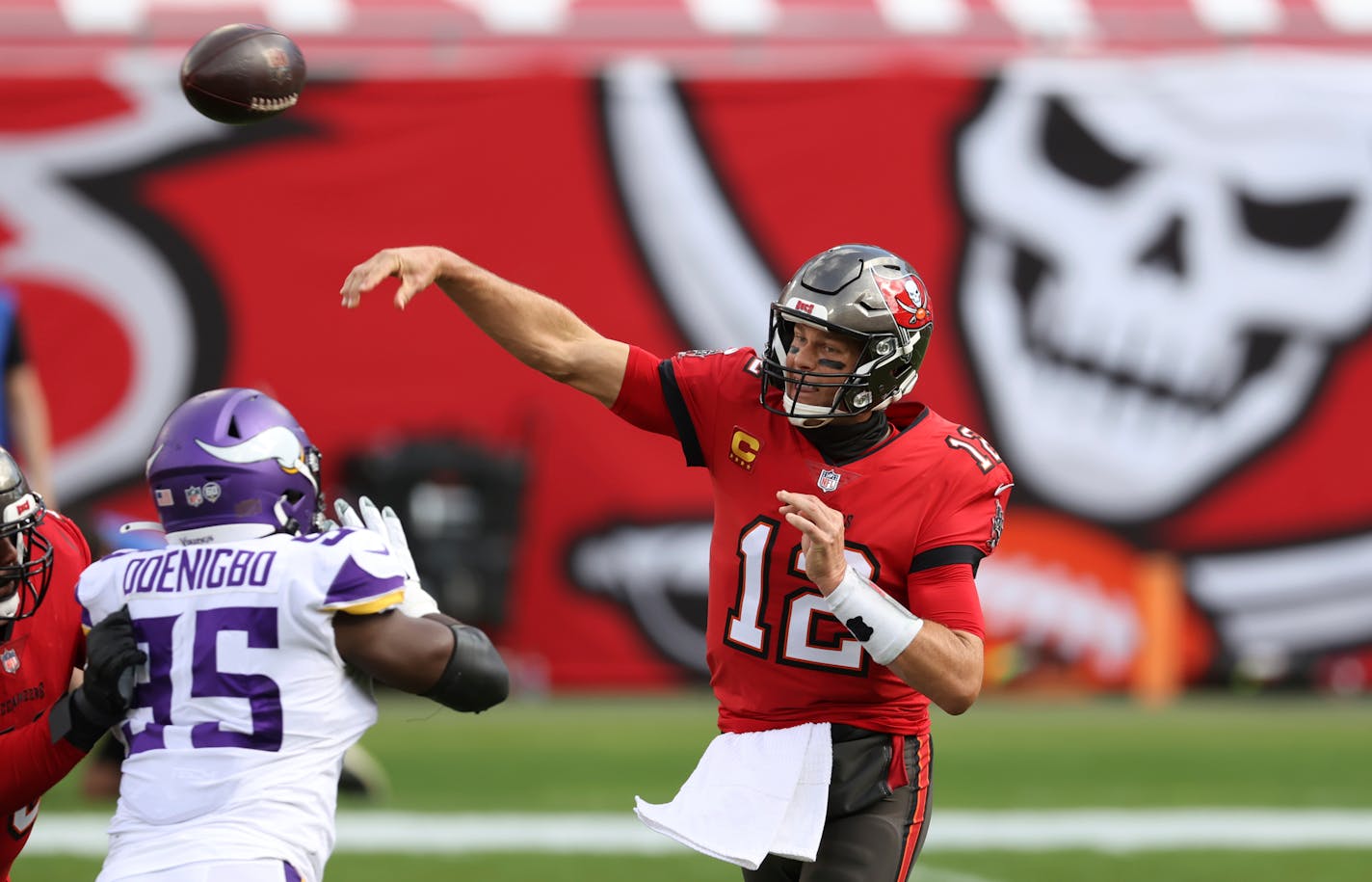 Tampa Bay quarterback Tom Brady throws a pass against the Vikings during the first half Sunday.