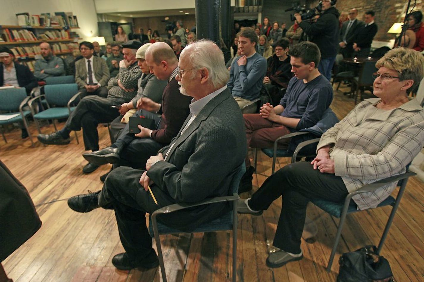 Members of Alliance Francaise and local journalists including 2013 Pulitzer Prize winning cartoonist Steve Sack, gathered in solidarity for the journalist that were killed by terrorists, at the the Twin Cities chapter of Alliance Francaise, Thursday, January 8, 2015 in Minneapolis, MN.