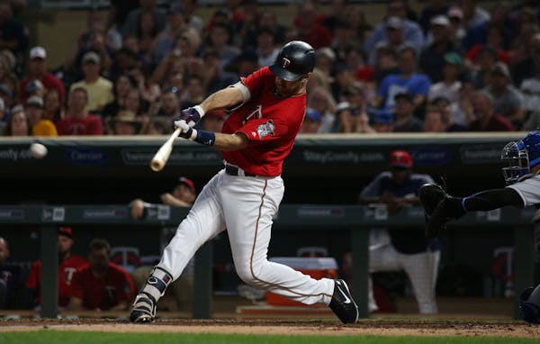 Joe Mauer singled against the Royals on Friday.