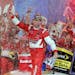 Kevin Harvick celebrates in Victory Lane after winning the NASCAR Sprint Cup series Bank of America 500 auto race at Charlotte Motor Speedway in Conco