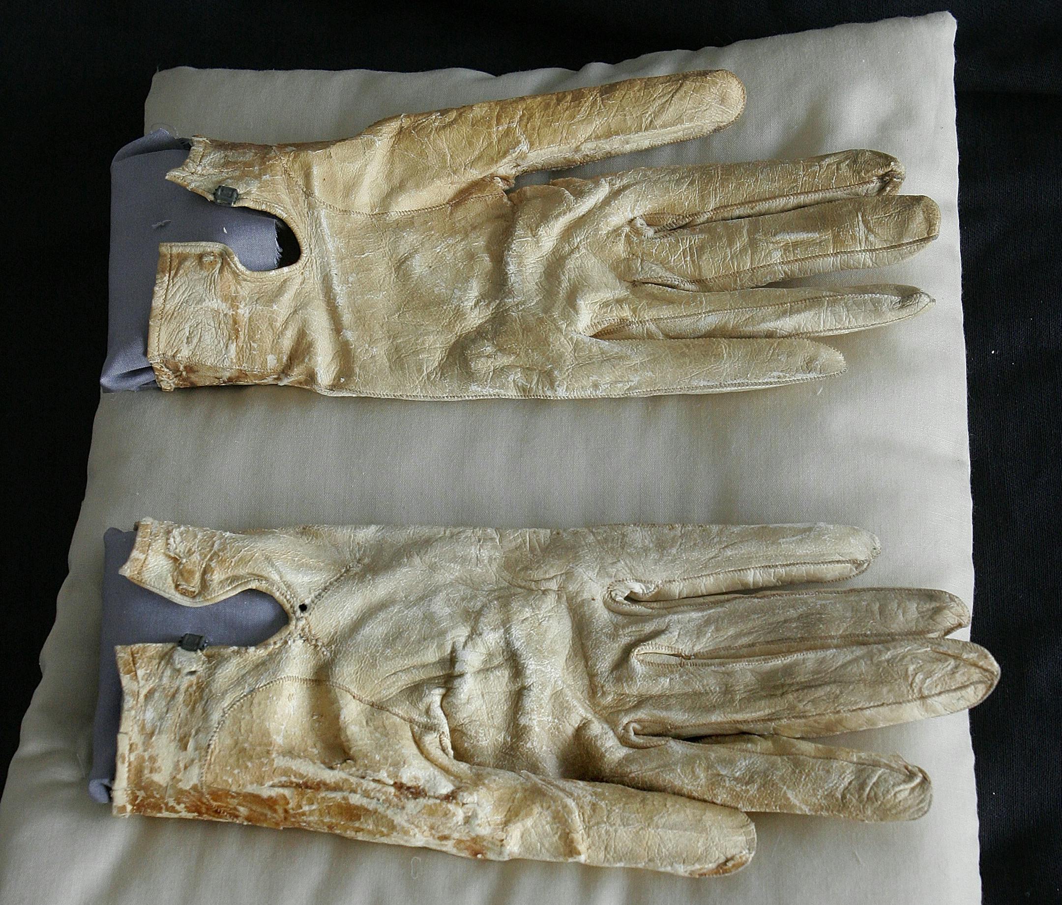 FILE - In this June 14, 2007 file photo, AAbraham Lincoln's bloodstained gloves he carried on the night of his death are photographed at the Abraham Lincoln Presidential Library and Museum in Springfield, Ill. The foundation that supports the library and museum says it might have to sell artifacts if it can't pay off a decade-old loan that financed items related to the 16th president. the foundation says it owes $10 million on a 2007 loan it obtained for the well-known Barry and Louise Taper Col