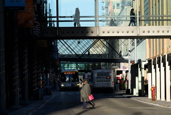 Pedestrians crossed the street and skyways along Nicollet Mall in downtown Minneapolis on Dec. 13.