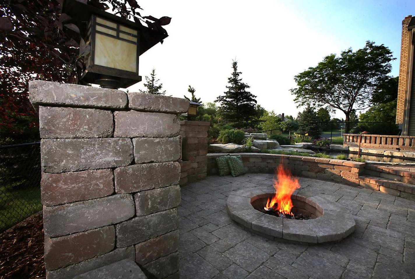 Cobblestone pavers are used as the main material of the patio at a home in Plymouth, Minn.