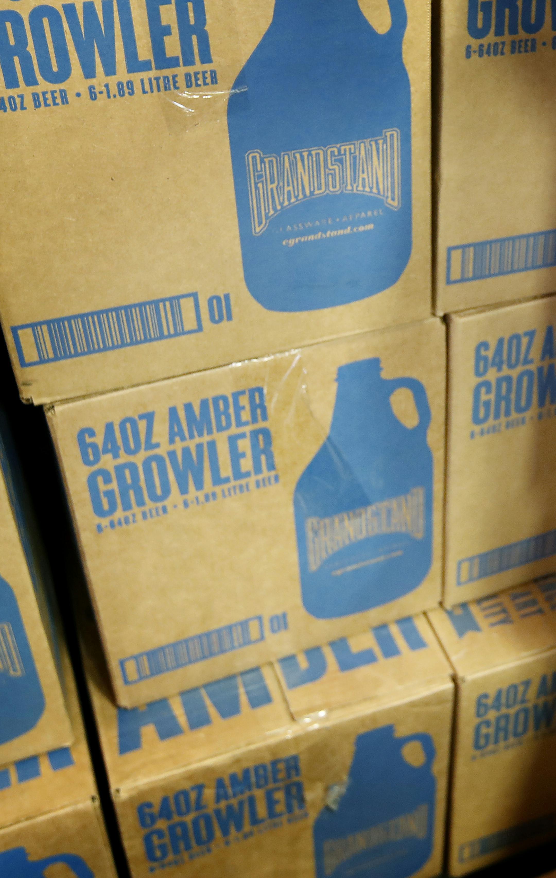 A box of empty growlers at Tin Whiskers in St. Paul. ] CARLOS GONZALEZ cgonzalez@startribune.com - October 4, 2016, St. Paul, MN, Tin Whiskers, one of the breweries that would be impacted by the change in liquor sale hours. They currently cannot sell growlers after 8 p.m. on weekdays, and this regulatory change would push that to 10 p.m.