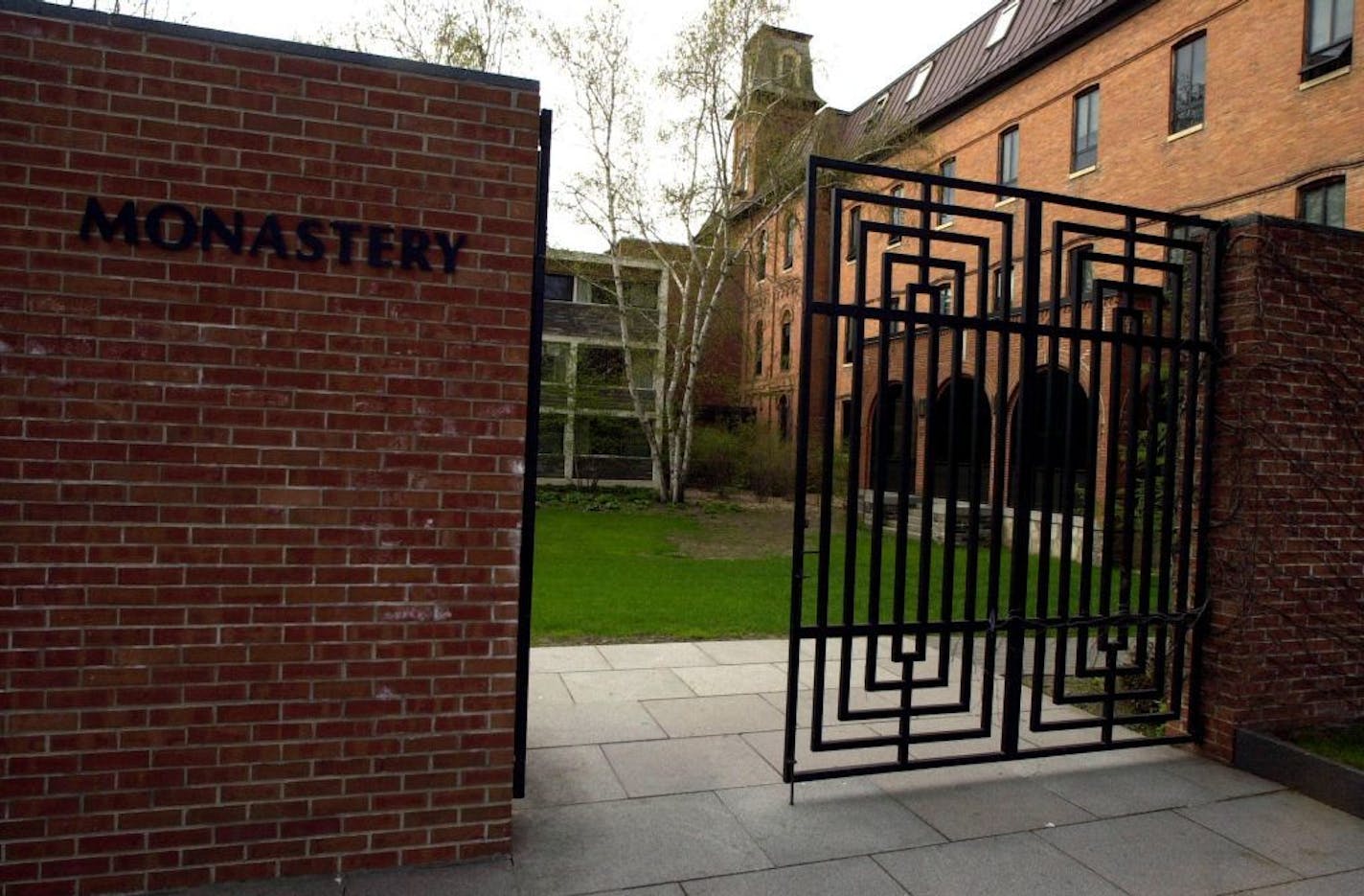 The main gate that leads to St. John's Abbey in Collegeville, Minn., is shown in 2002.