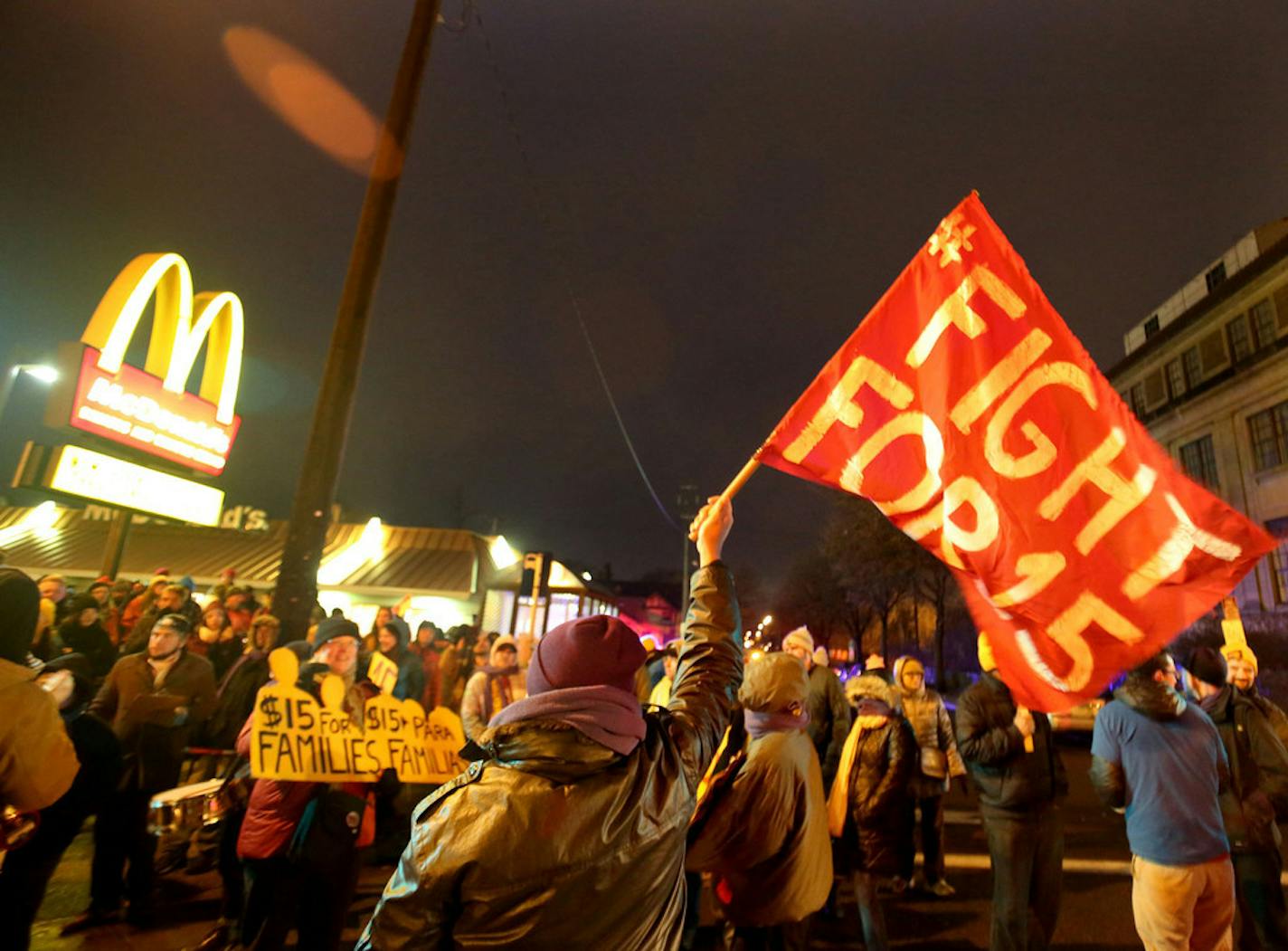 Protesters for Nationwide Fight for $15 Day of Disruption at a Minneapolis McDonald's in 2018. A Minneapolis City Council ordinance kicks in this month that puts employers of more than 100 workers on the path to a $15 minimum wage by 2022, and by July 2024 for smaller firms.