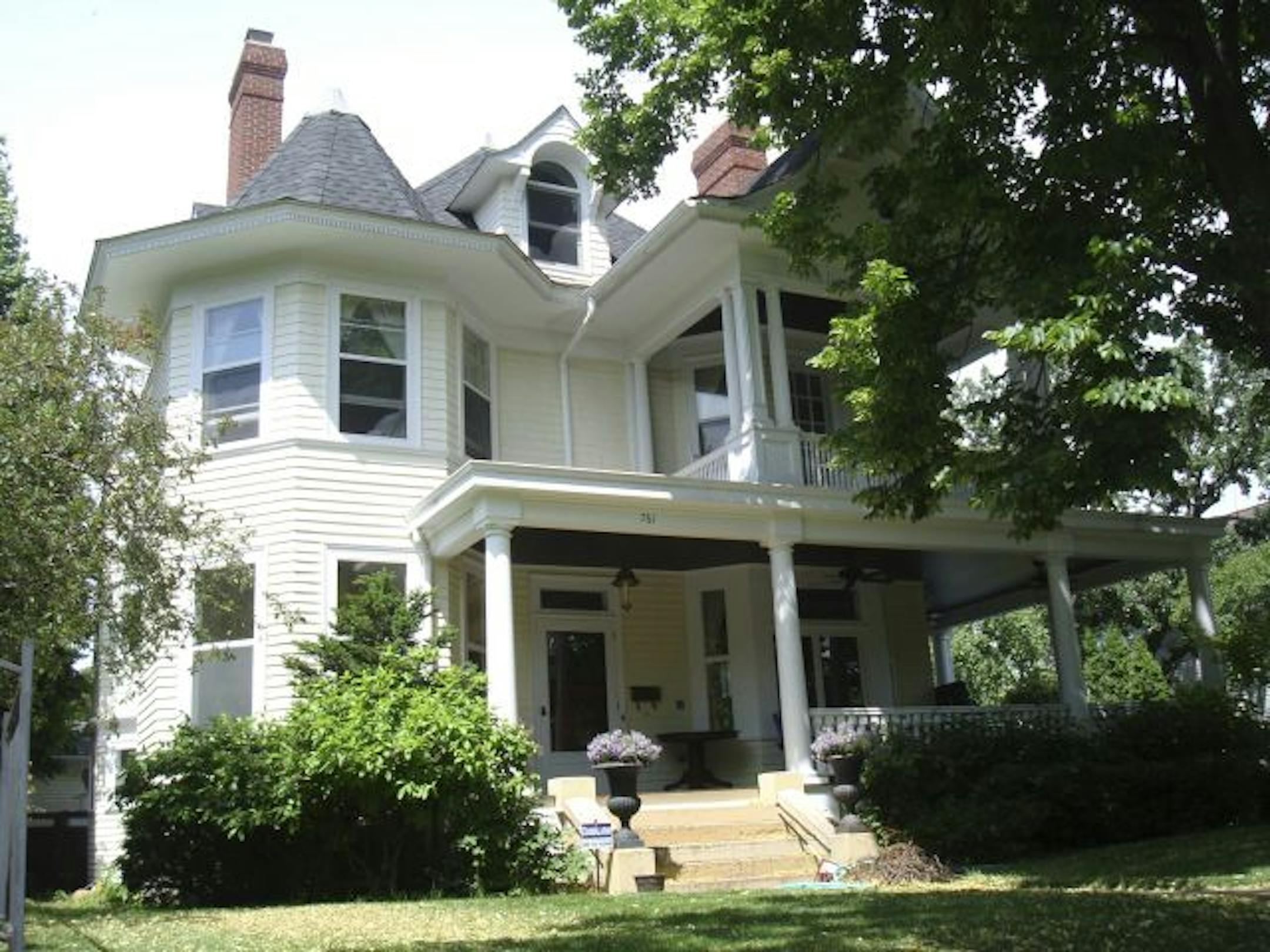 This Queen Anne home, built in 1891, includes a two-story polygonal tower.