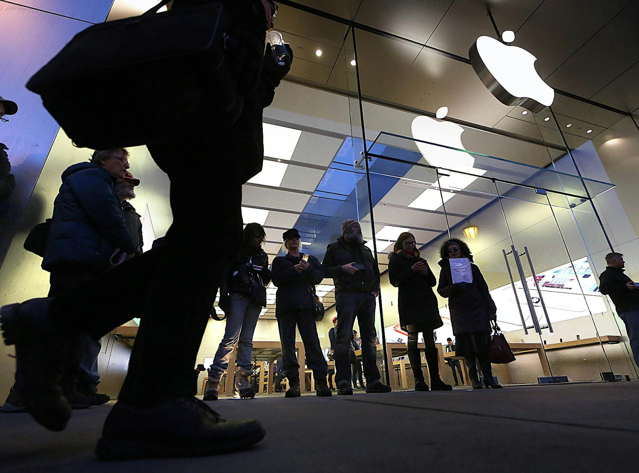 People who described themselves as concerned citizens (and not from any formal group) stood outside the Apple Store on Hennepin Ave. to express their concern for the request by the FBI to unlock an encrypted iPhone.] JIM GEHRZ ï james.gehrz@startribune.com / Minneapolis, MN / February 24, 2016 / 5:30 PM ñ BACKGROUND INFORMATION: On Tuesday, protesters are preparing to assemble at the Apple Store, 3018 Hennepin Ave. in Minneapolis. Rallies are taking place in more than 30 cities to lash