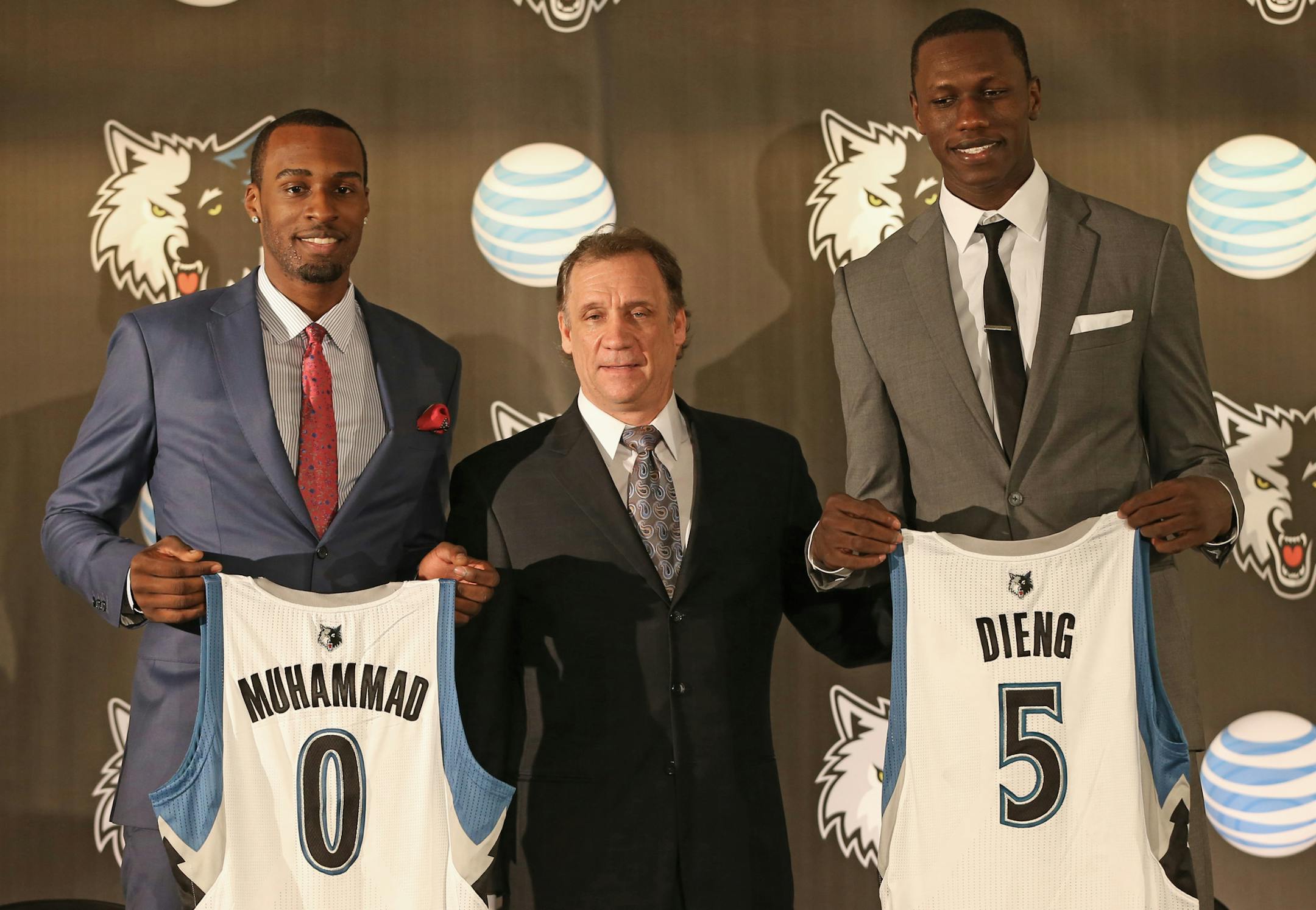 (middle) Flip Saunders presented (left) Shabazz Muhammad and (right) Gorgui Dieng with their Timberwolves jerseys during an introduction press conference at the Target Center on 6/28/13.] Bruce Bisping/Star Tribune bbisping@startribune.com Shabazz Muhammad and Gorgui Dieng/source.