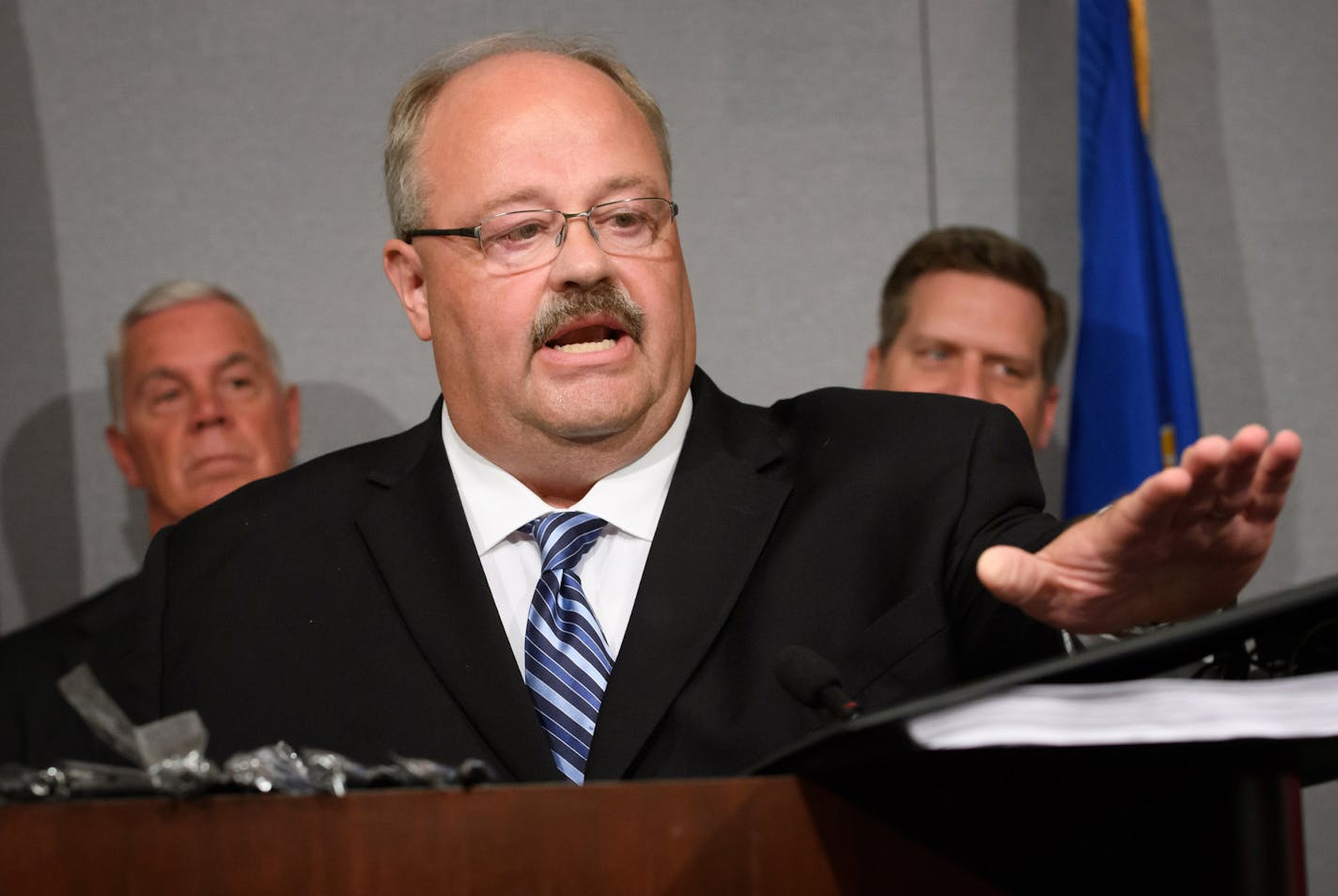 House GOP Tax Chair Greg Davids pounded a copy of the tax bill and asked the governor to sign it. At a press conference today Republicans called on Governor Dayton to sign the tax bill and brought out a group of Minnesotans waiting for the relief offered in the bill. ] GLEN STUBBE * gstubbe@startribune.com Monday, June 6, 2016, At a press conference today Republicans called on Governor Dayton to sign the tax bill and brought out a group of Minnesotans waiting for the relief offered in the bill.