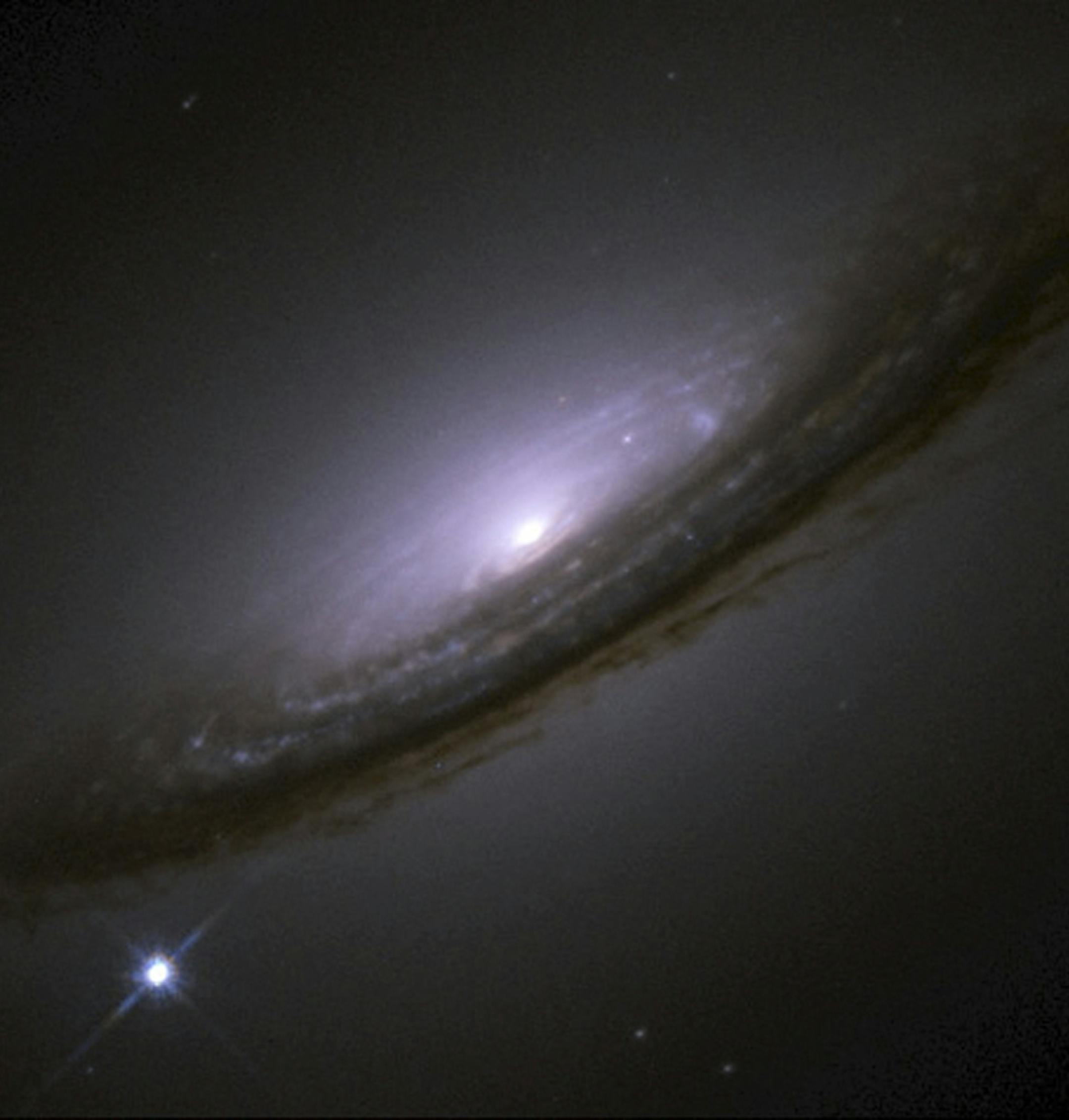 Supernova 1994D, a Type 1a supernova outside a galaxy in the Virgo cluster, in an undated handout photo. Adam Riess, Saul Perlmutter and Brian Schmidt shared the Nobel Prize in physics awarded on Tuesday, Oct, 4, 2011, all the leaders of two competing teams of astronomers who were trying to use the exploding stars known as Type 1a supernovae as cosmic lighthouses to measure the expansion of the universe. (Chandra via The New York Times) -- NO SALES; FOR EDITORIAL USE ONLY WITH STORY SLUGGED NOBE