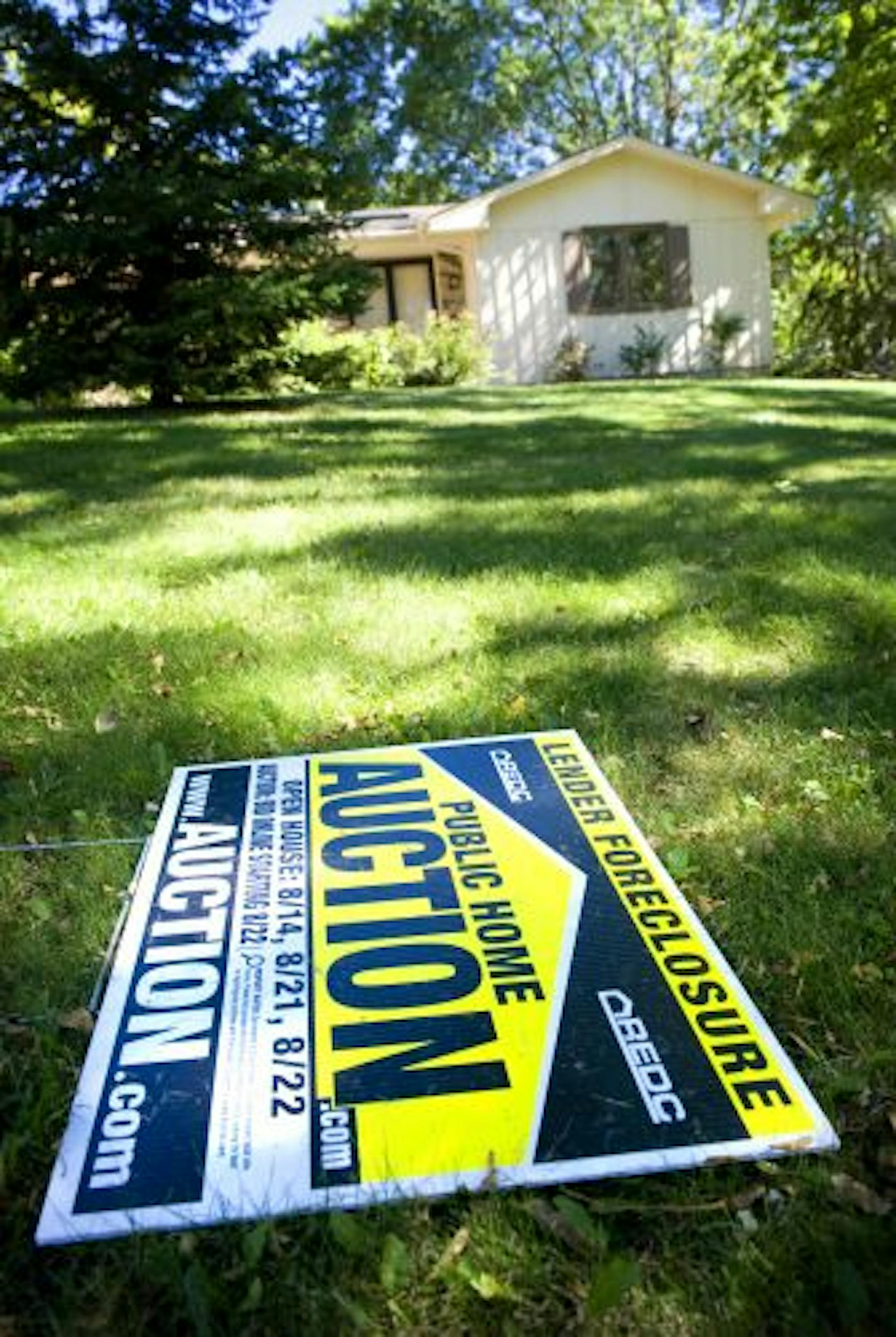 A foreclosed home at 13233 Highview Drive, Burnsville, sold at auction in summer 2010 for $112,875. It once had been valued at $265,000.