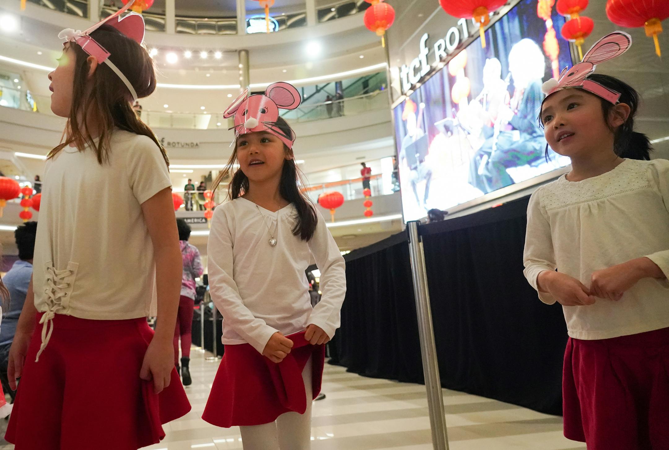 Kindergarten students from Xin Xing School in Hopkins wore hats with ears to celebrate the Year of the Rat in the rotunda at Mall of America. From left, Quinn Sparby, Olivia Kon and Chloe Chan danced. ] Shari L. Gross • shari.gross@startribune.com Together the Chinese + American audiences will celebrate the Chinese New Year, "Year of the Rat," + share a Chinese cultural experience in an atmosphere of festive joy. The Chinese New Year Celebration will be composed of rich cultural presentat