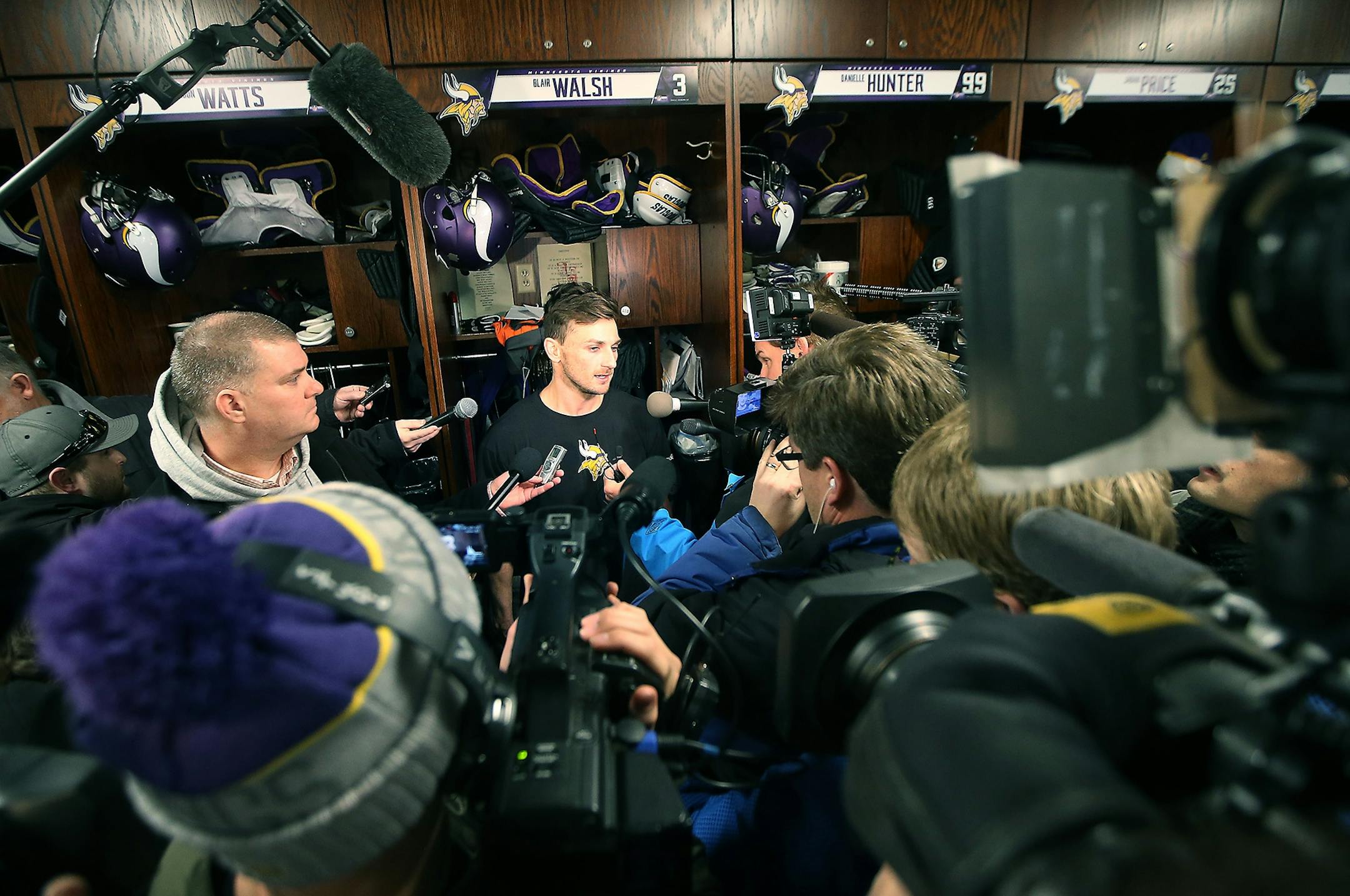 Minnesota Vikings Blair Walsh was surrounded by the media as he made his way to his locker at Winter Park, Monday, January 11, 2016 in Eden Prairie, MN.