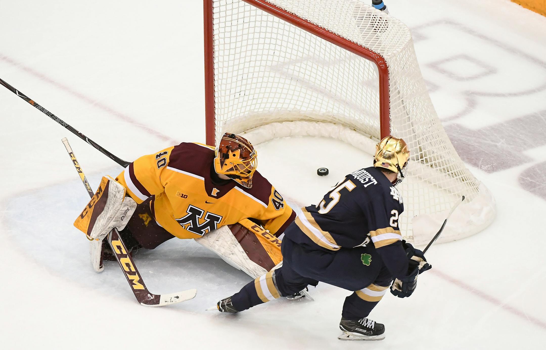 Notre Dame forward Dylan Malmquist scored an unassisted goal on Gophers goaltender Mat Robson